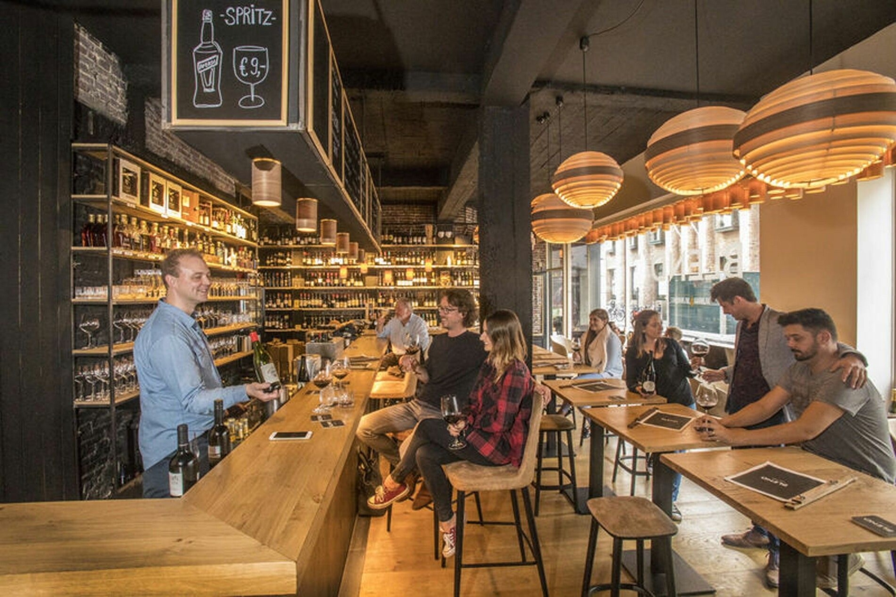 People gathered at a bar.