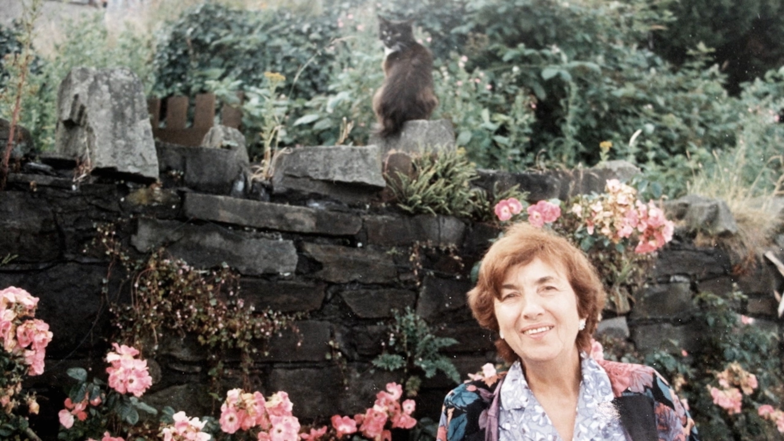older woman and roses
