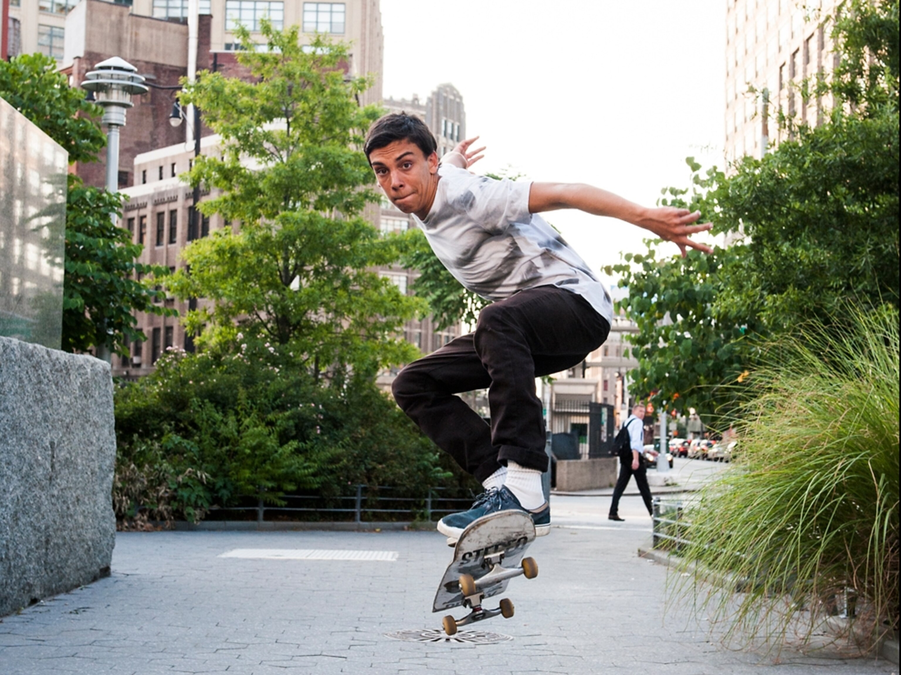 Booker Mitchell jumping on his skateboard