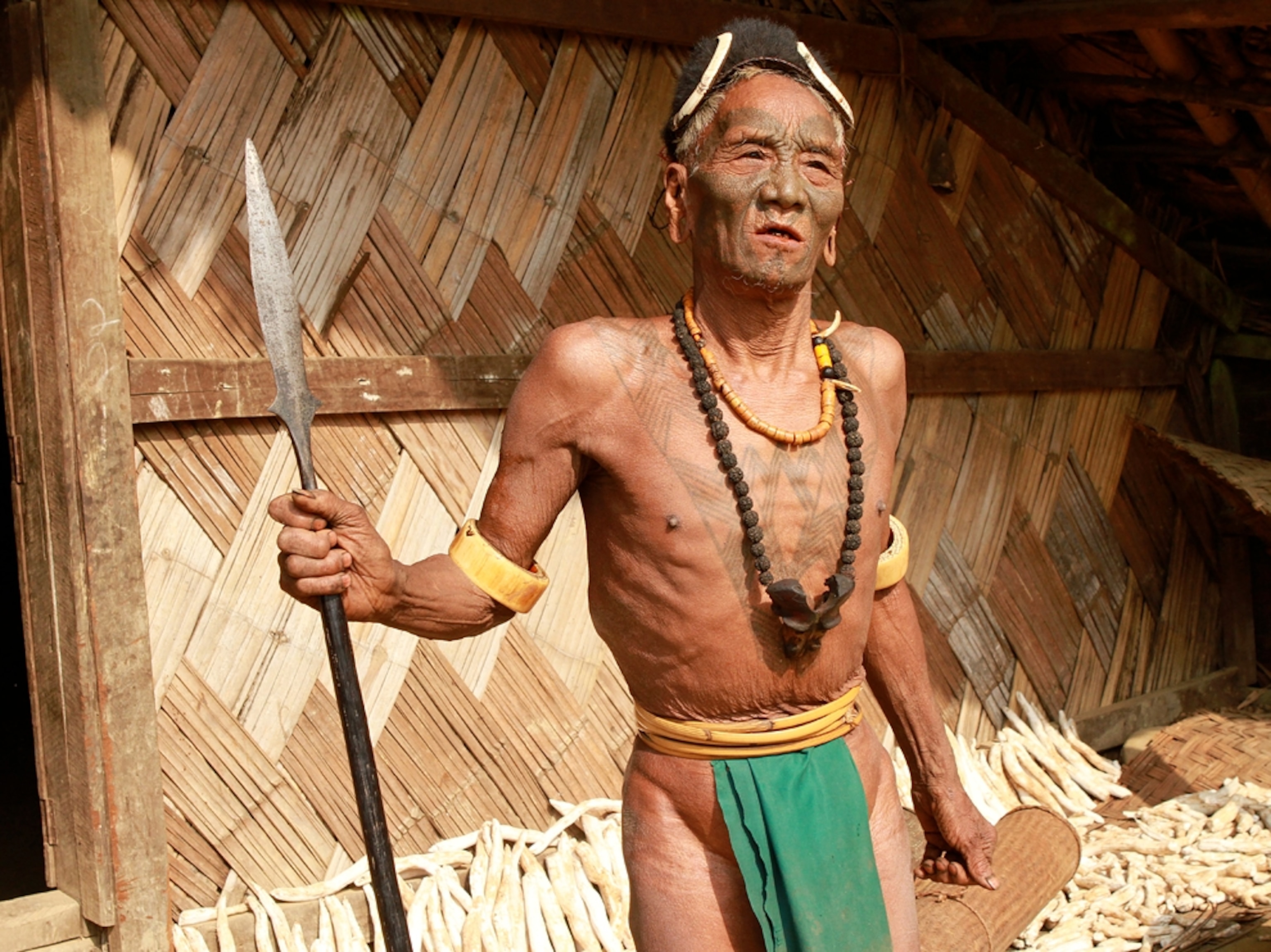 A tattooed Naga elder