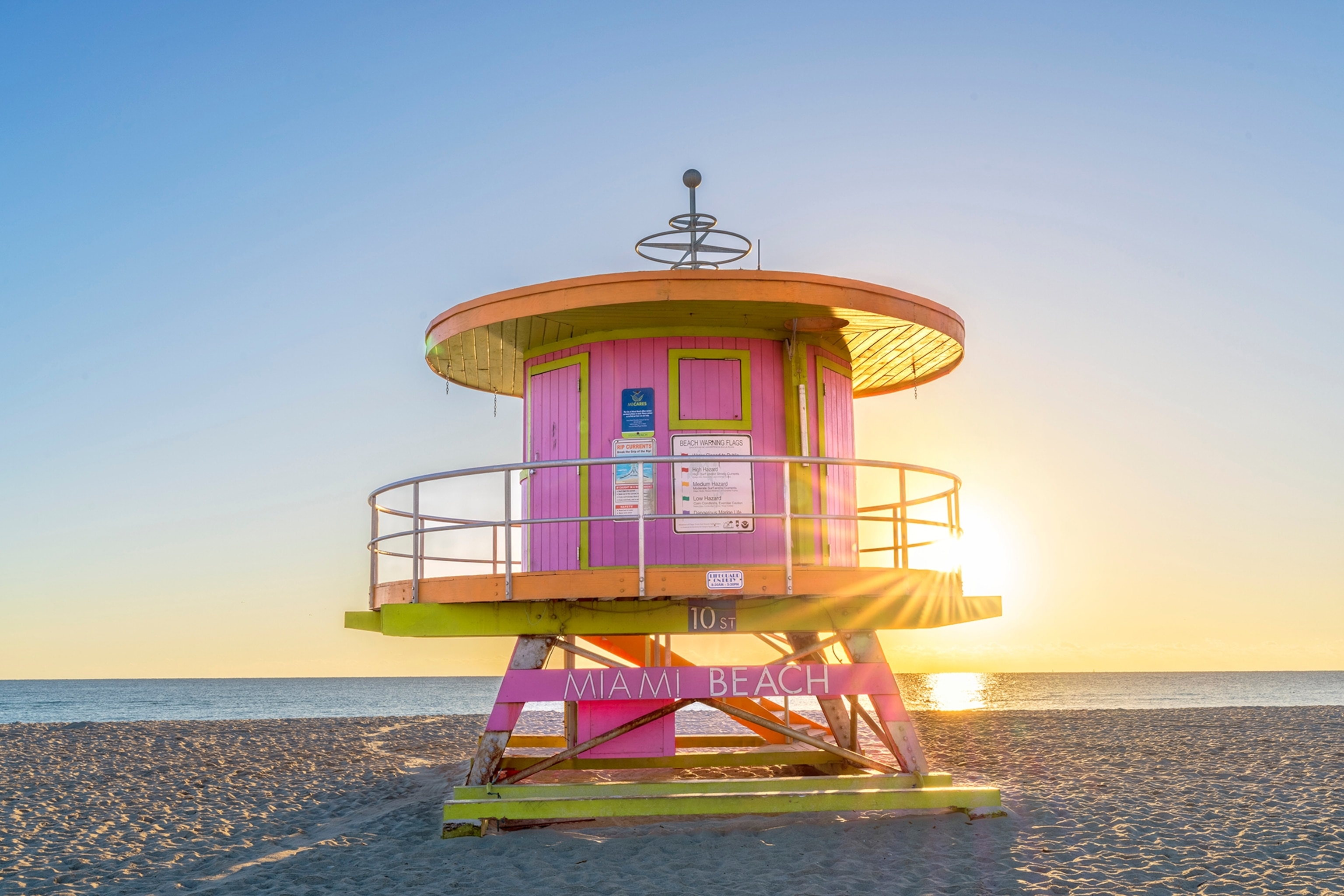 A beach lifeguard house at sunrise.