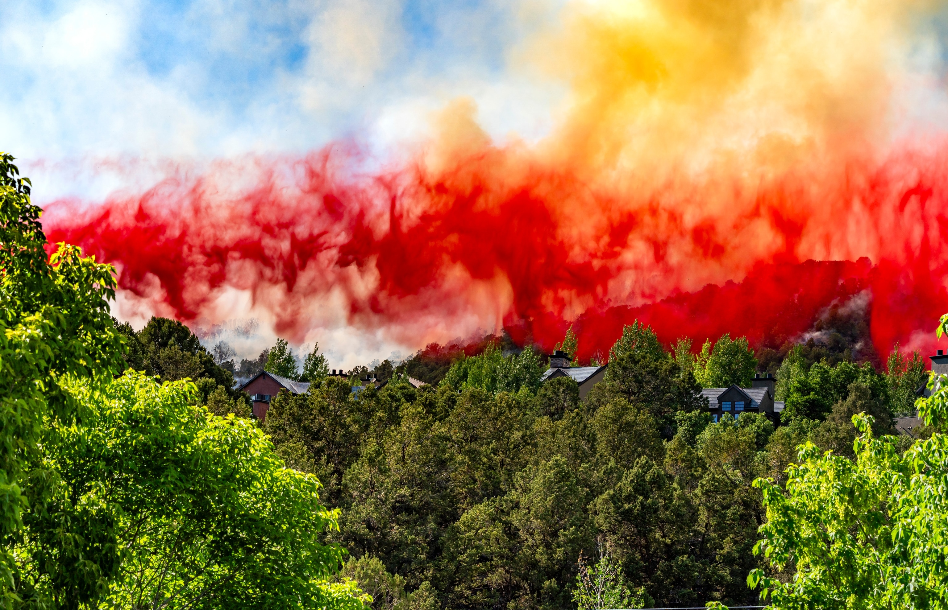 Fire retardant dropped on houses in Colorado during the Lake Christine Fire.