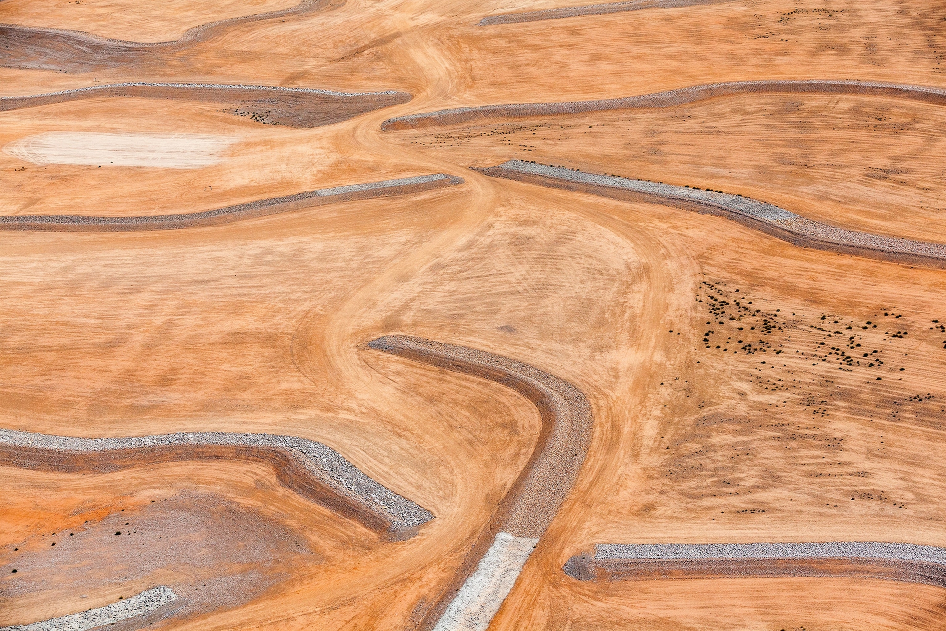 the landscape seen from the window seat of a plane over Clark County in Las Vegas, Nevada
