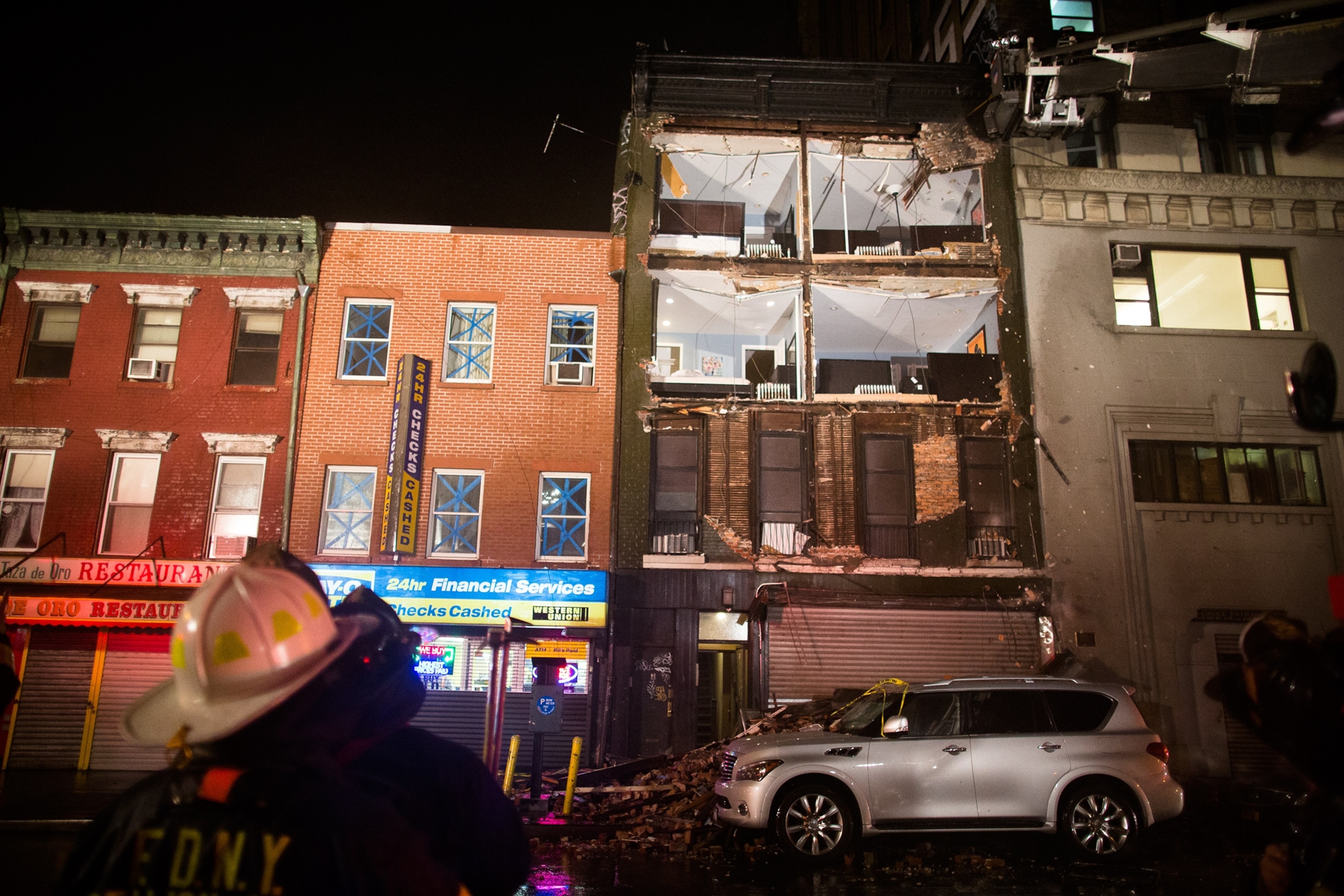 a New York City building wall being torn off