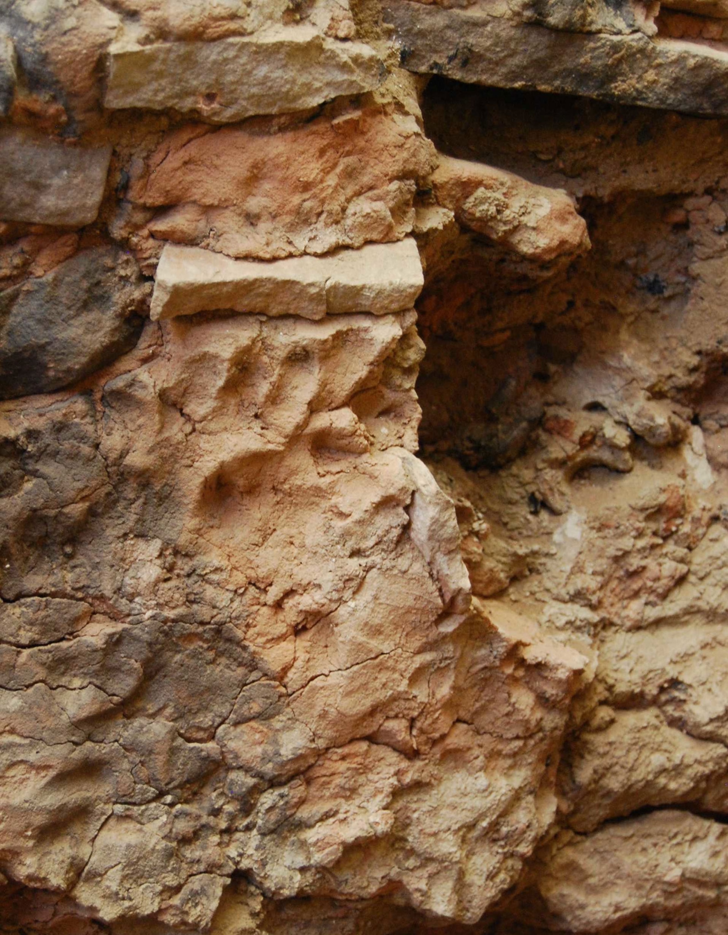 a footprint with six toes in a plaster wall in Pueblo Bonito, Chaco Canyon, New Mexico