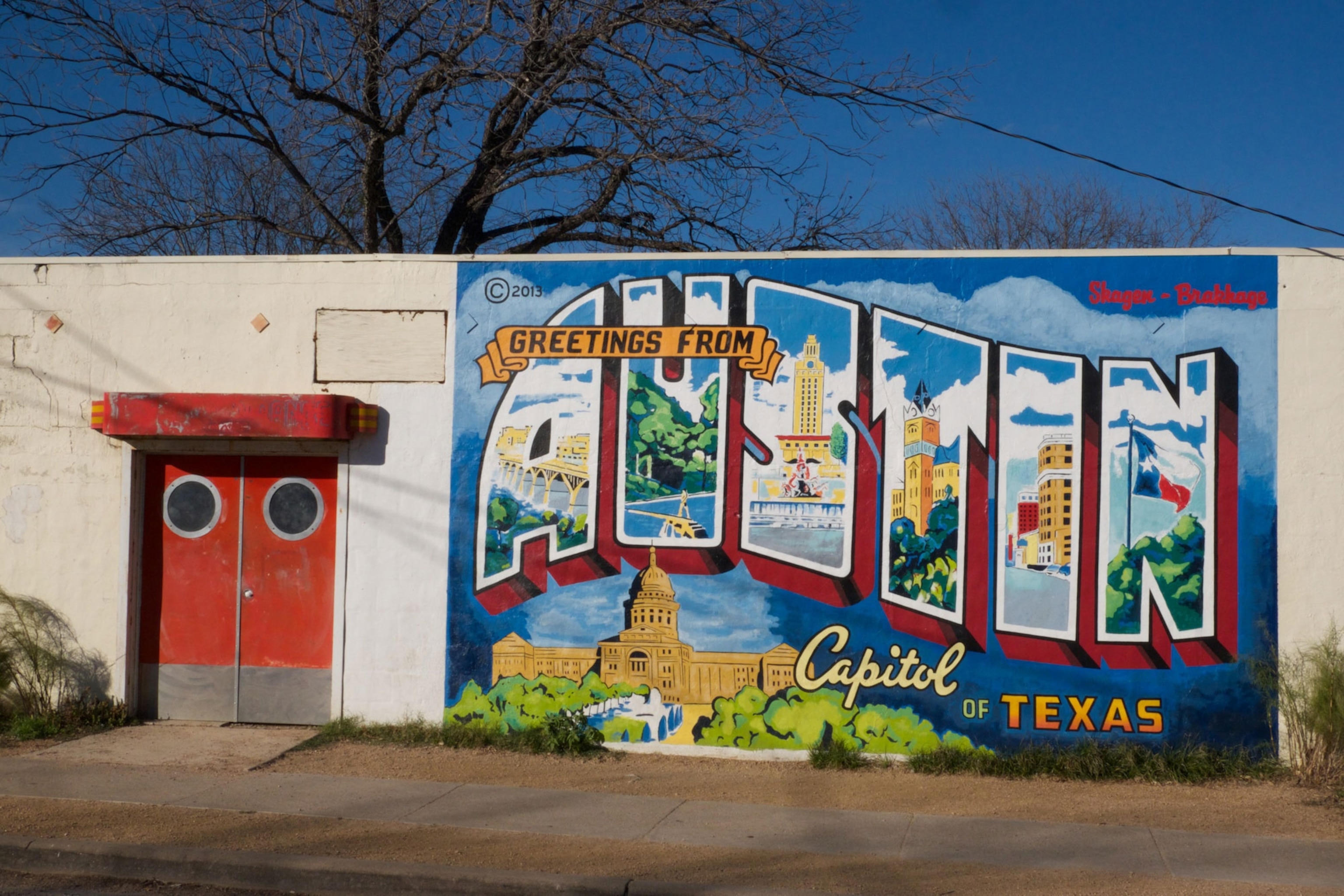 a mural of a postcard for Austin Texas