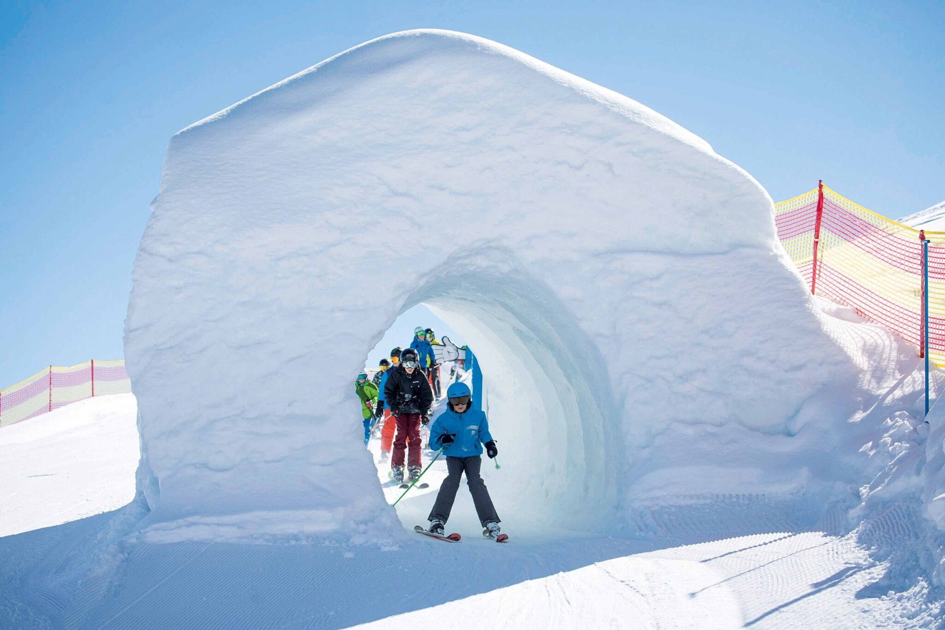 Ski lessons in a snow park, Alpbach, Austria.
