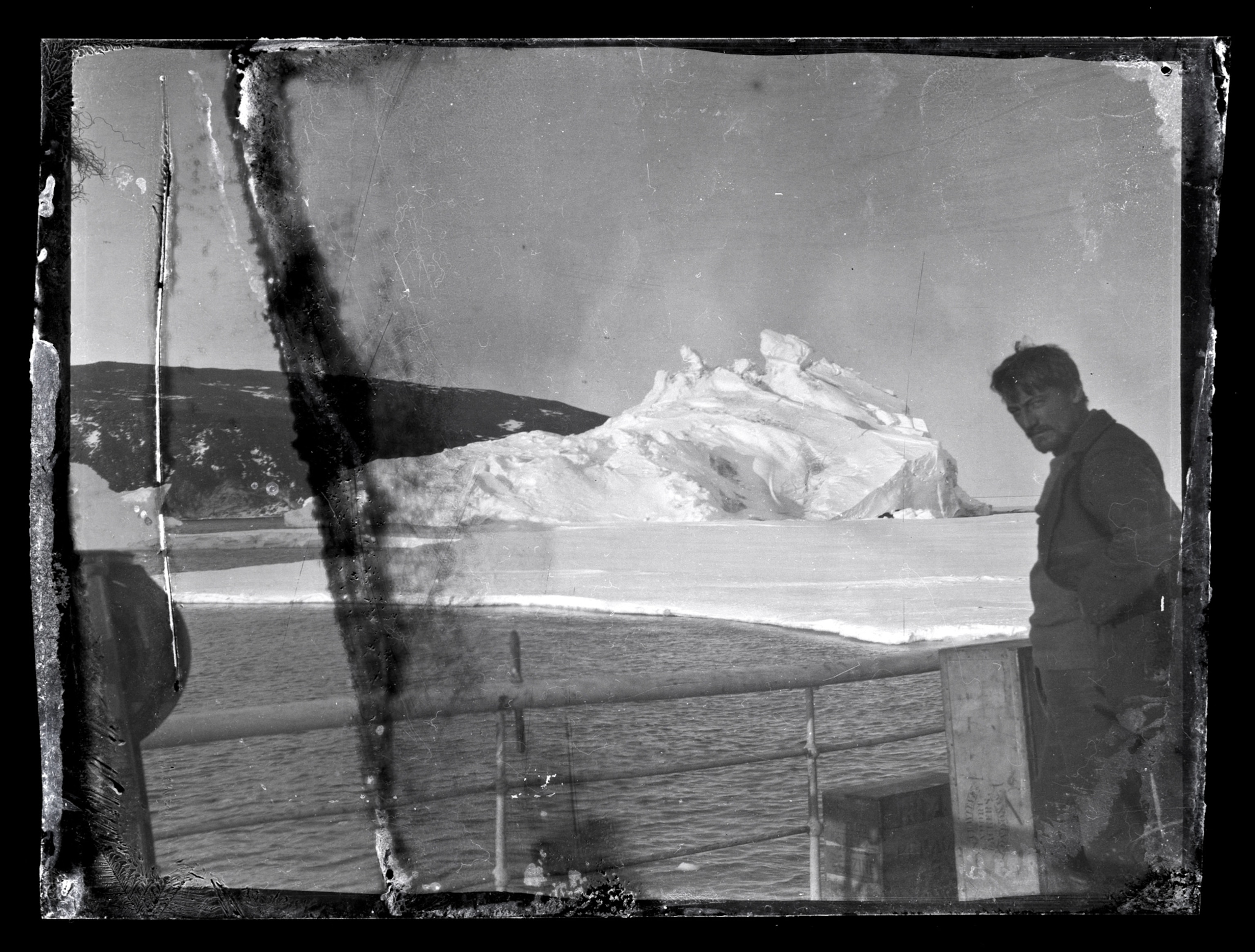 Alexander Stevens on the deck of the Aurora, McMurdo Sound, Antarctica.