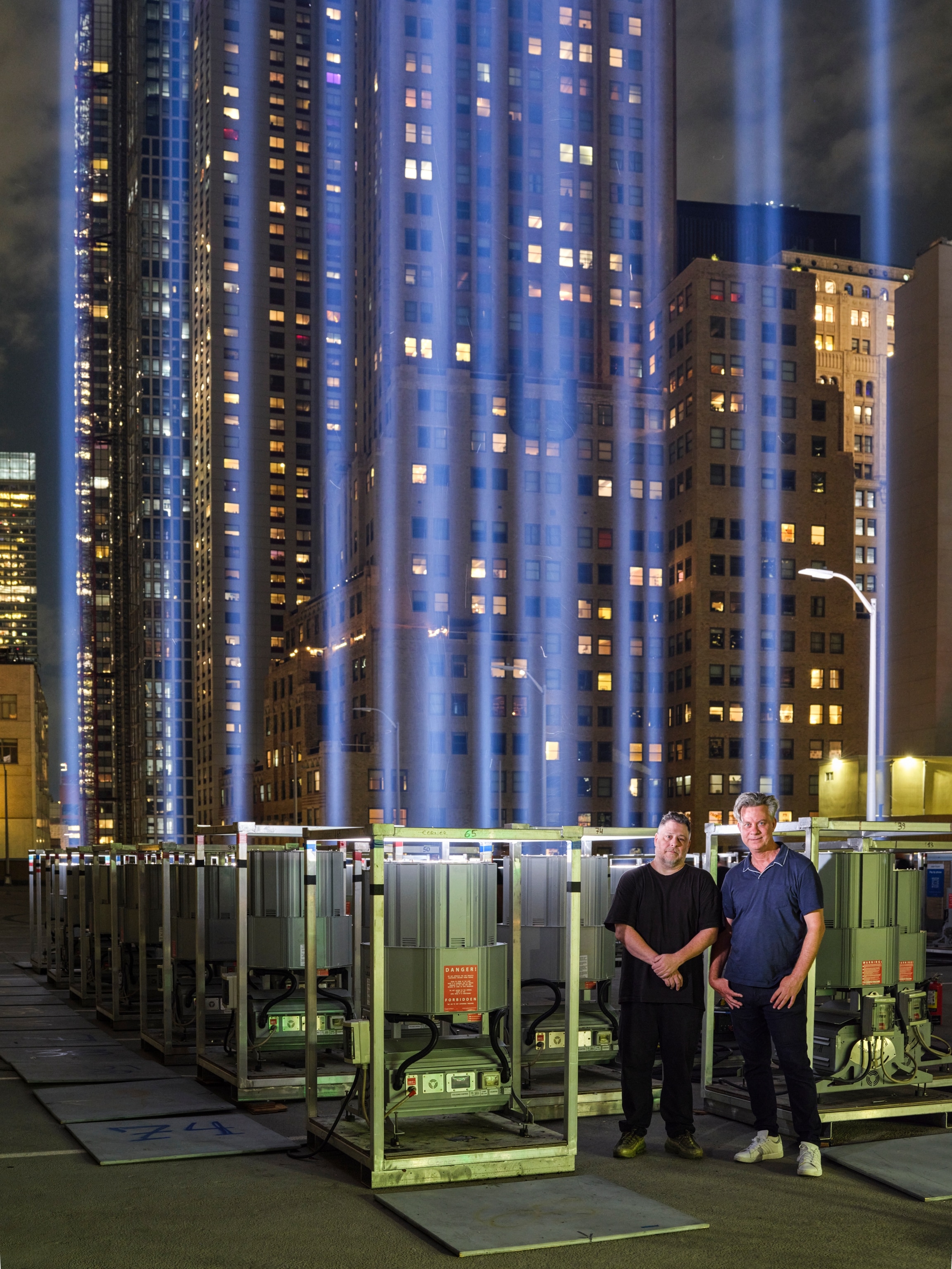 two gentleman in front of Tribute in Light
