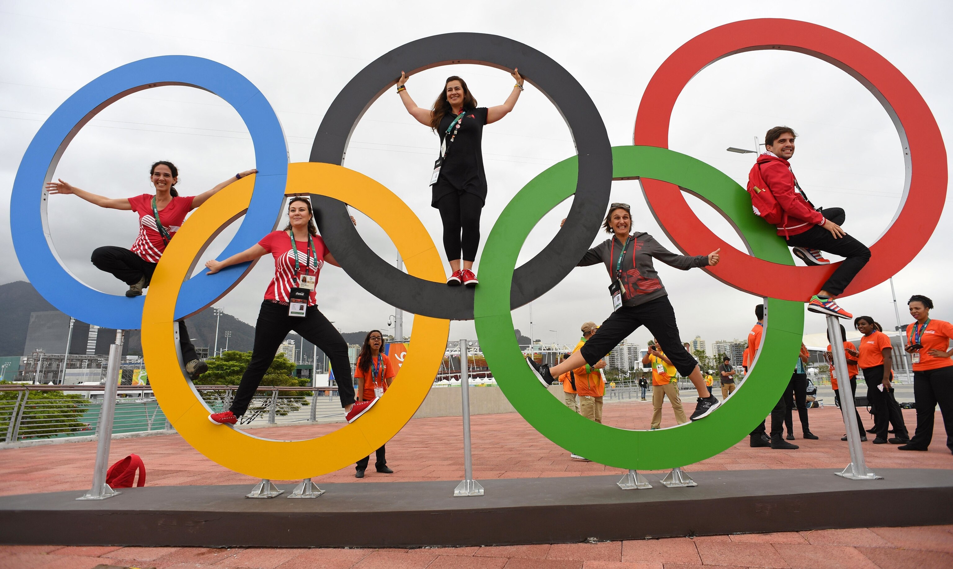 visitors posing in the Olympic rings at Olympic Park, Rio de Janeiro, Brazil