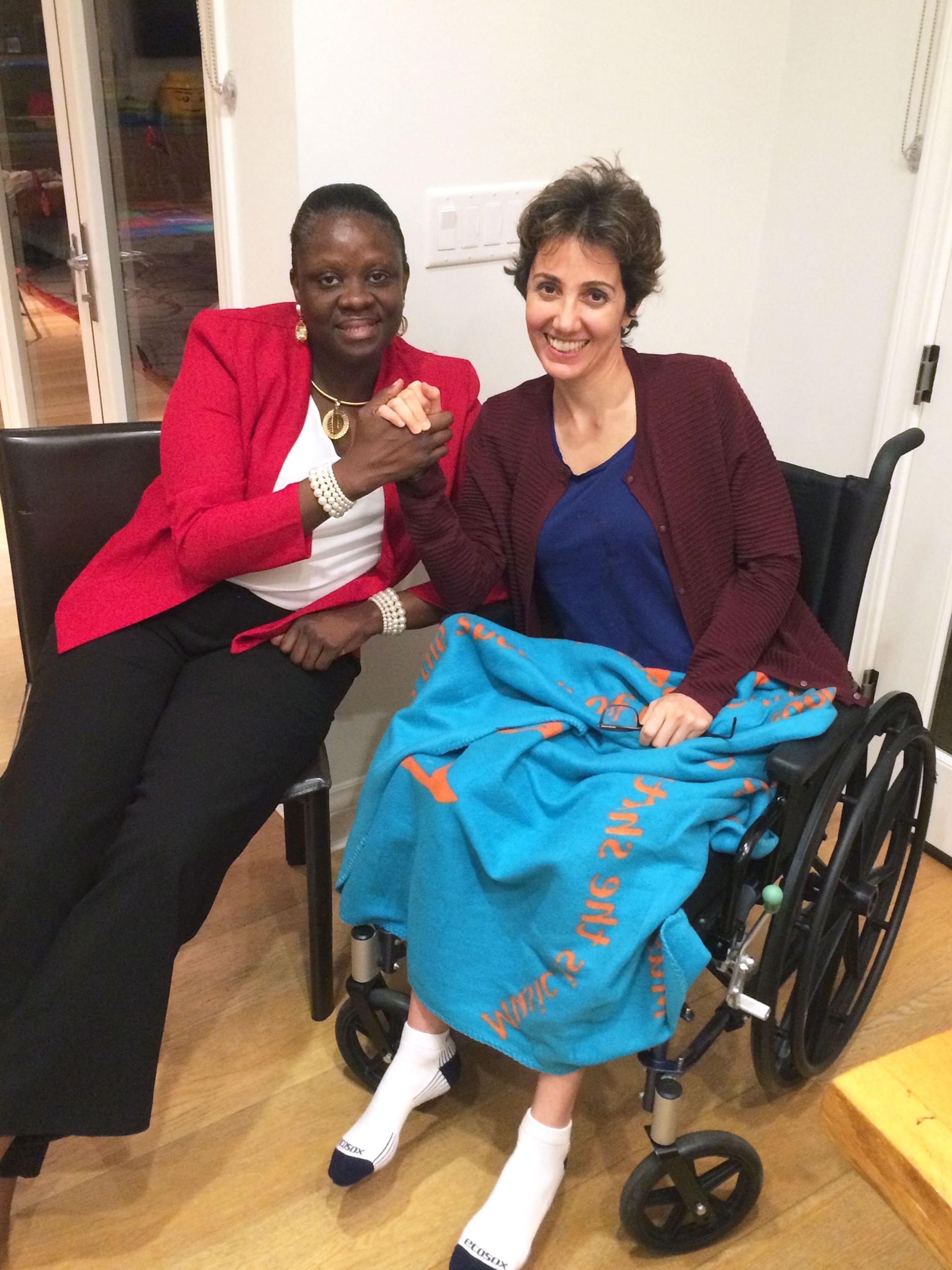 Pardis visiting with a friend from Sierra Leone