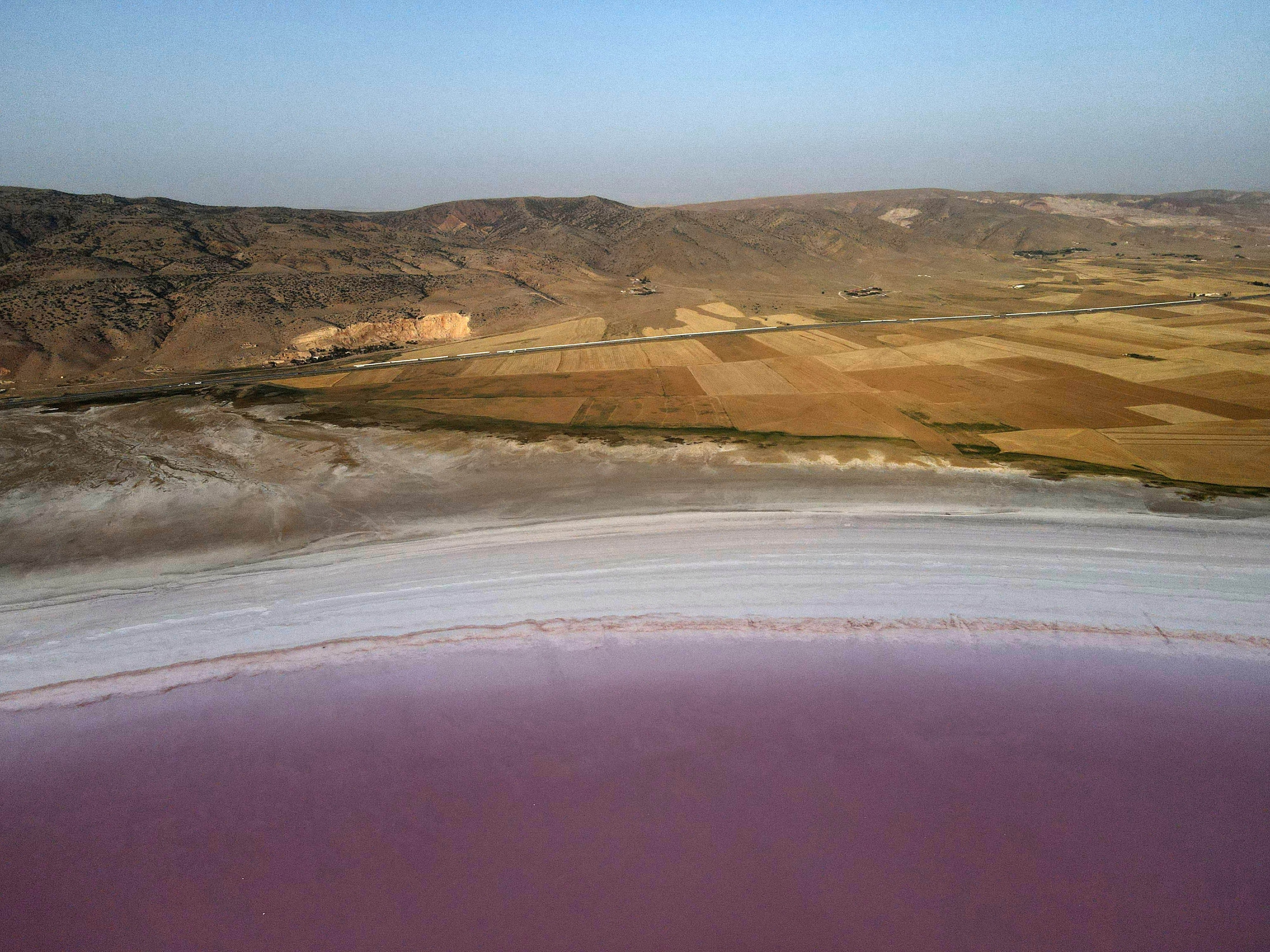 A wide view of a pink lake in turkey