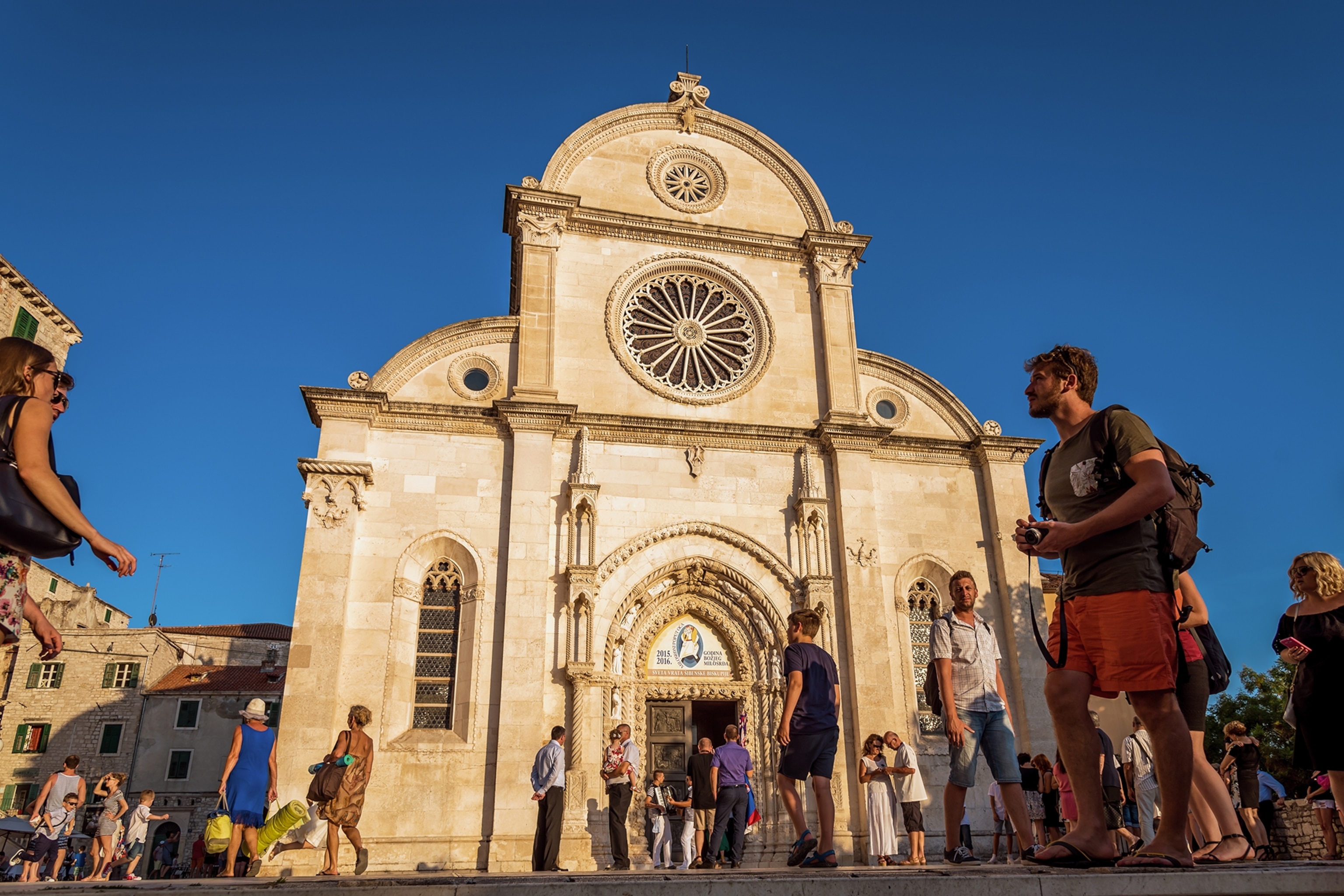 Exterior of a white cathedral against a blue sky