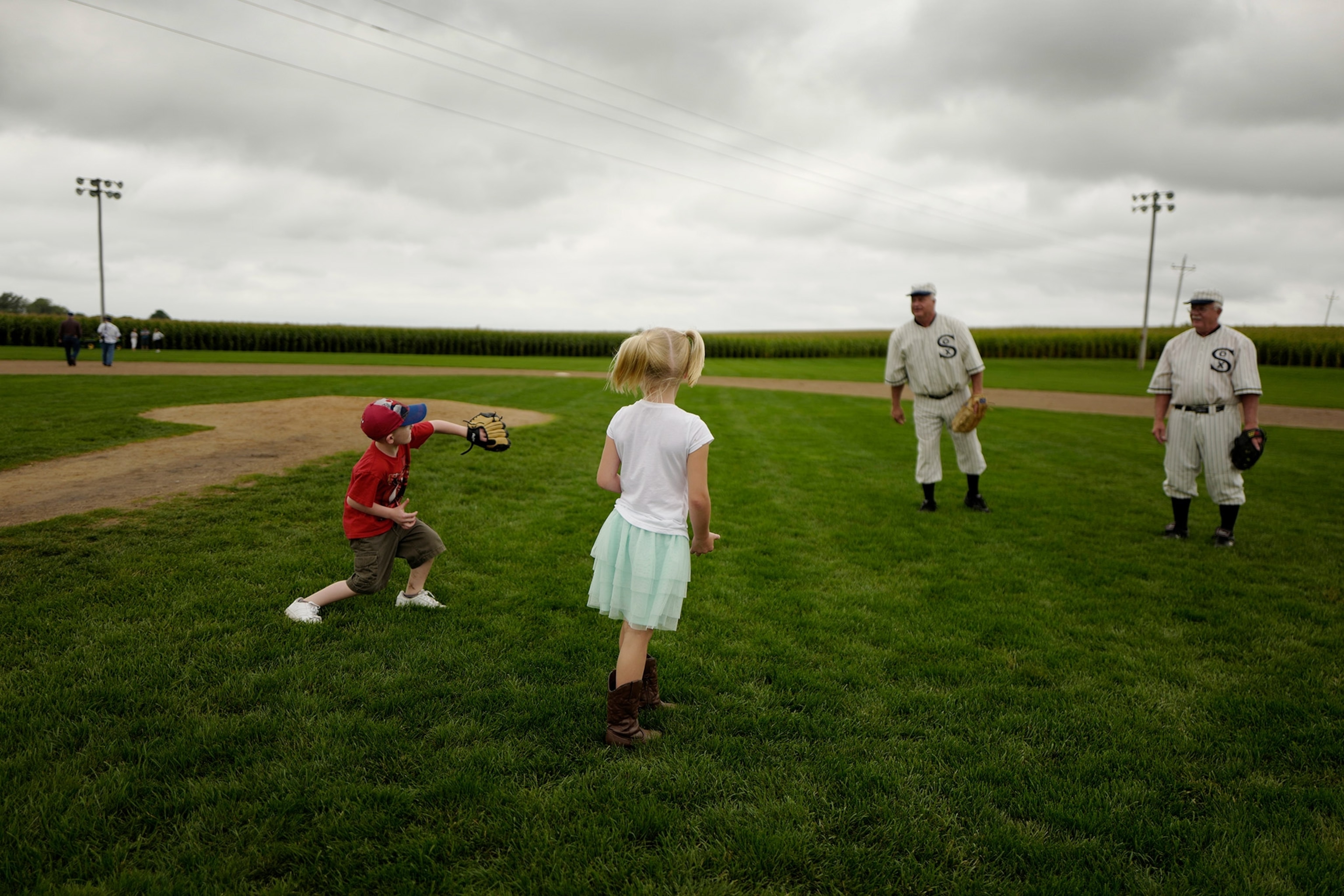 visitors on the field used in the film 'Field of Dreams' in Dyersville, Iowa