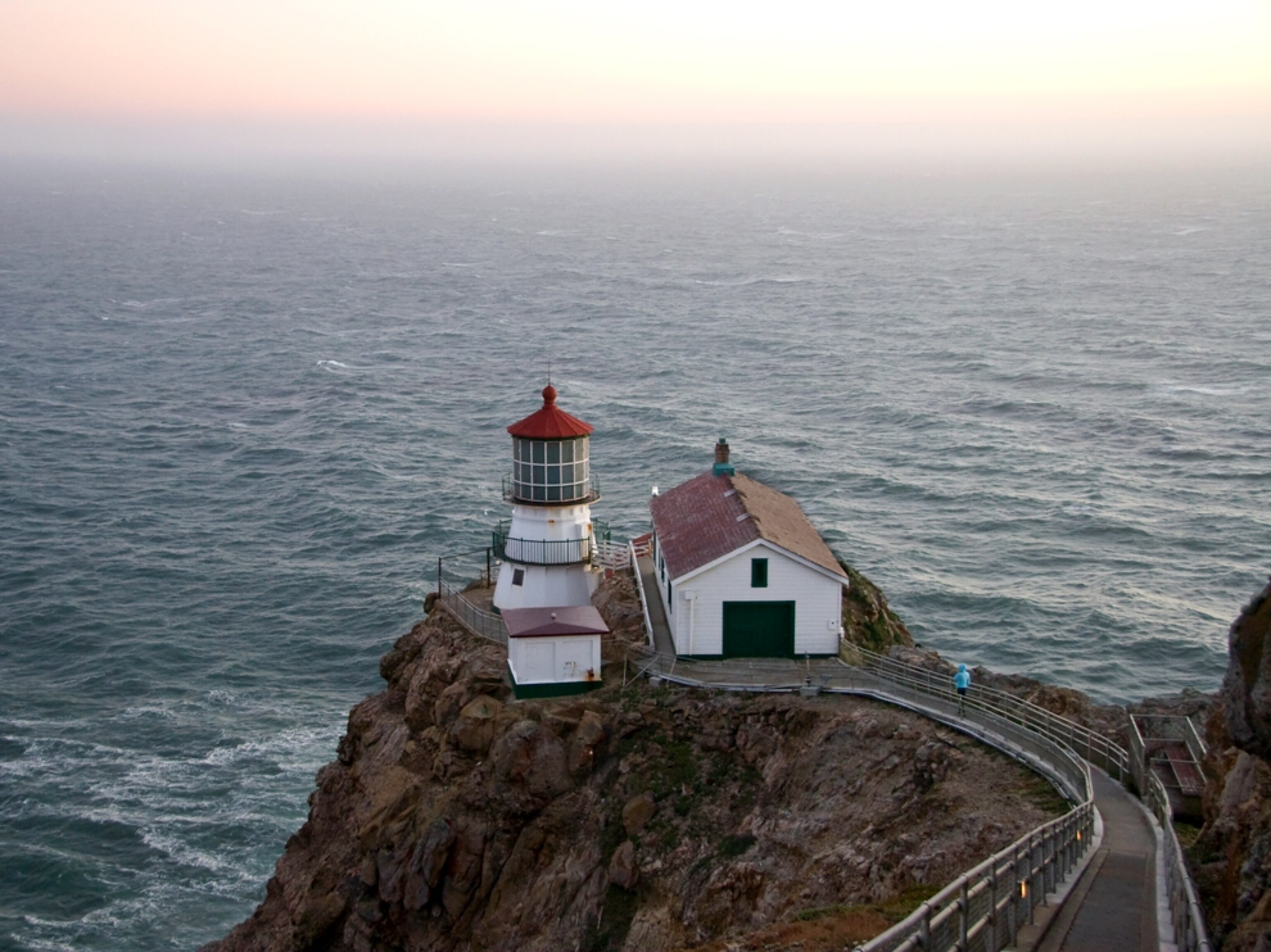 Person walking towards the Point Reyes Lighthouse at Point Reyes National Seashore