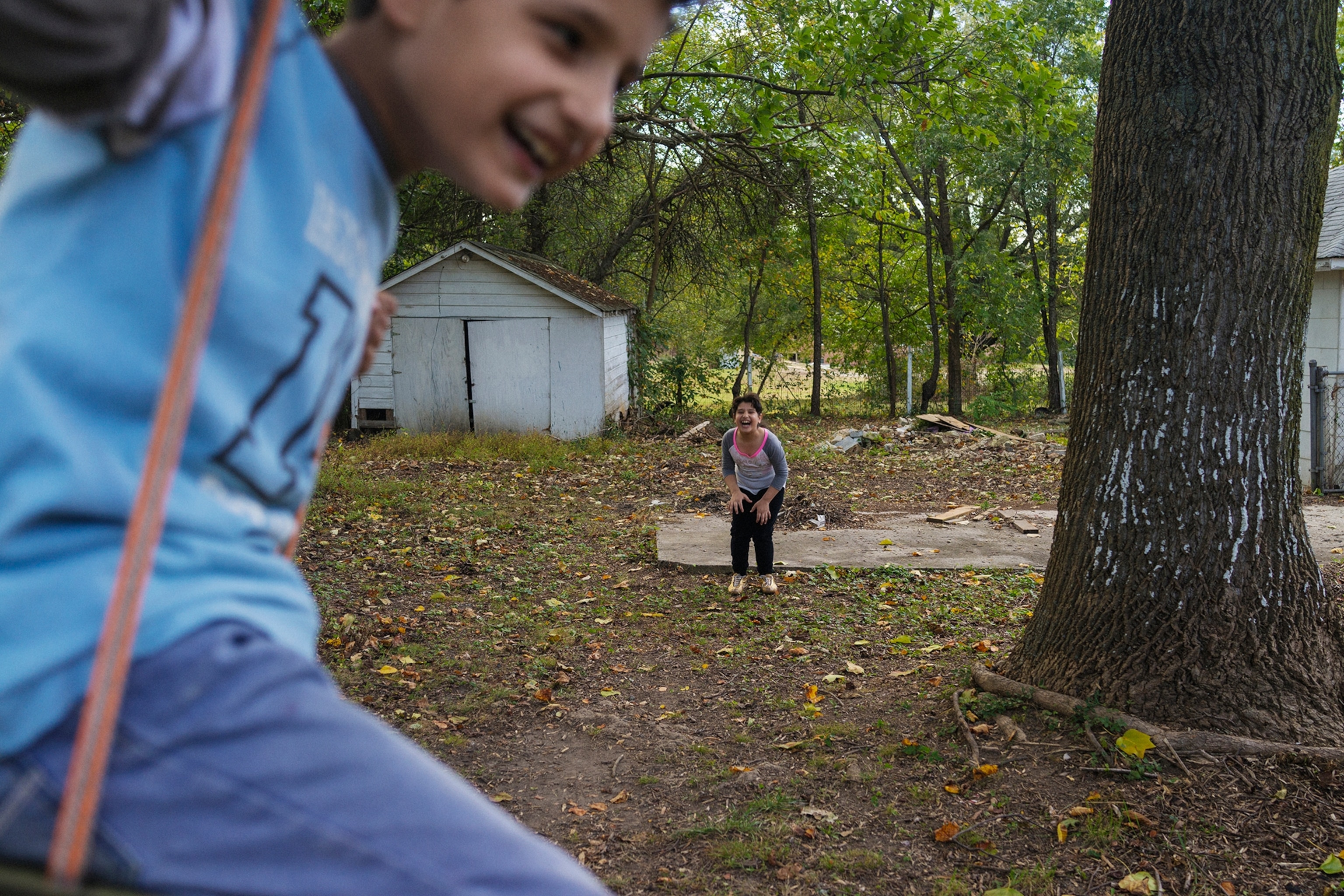 children playing on a swingset