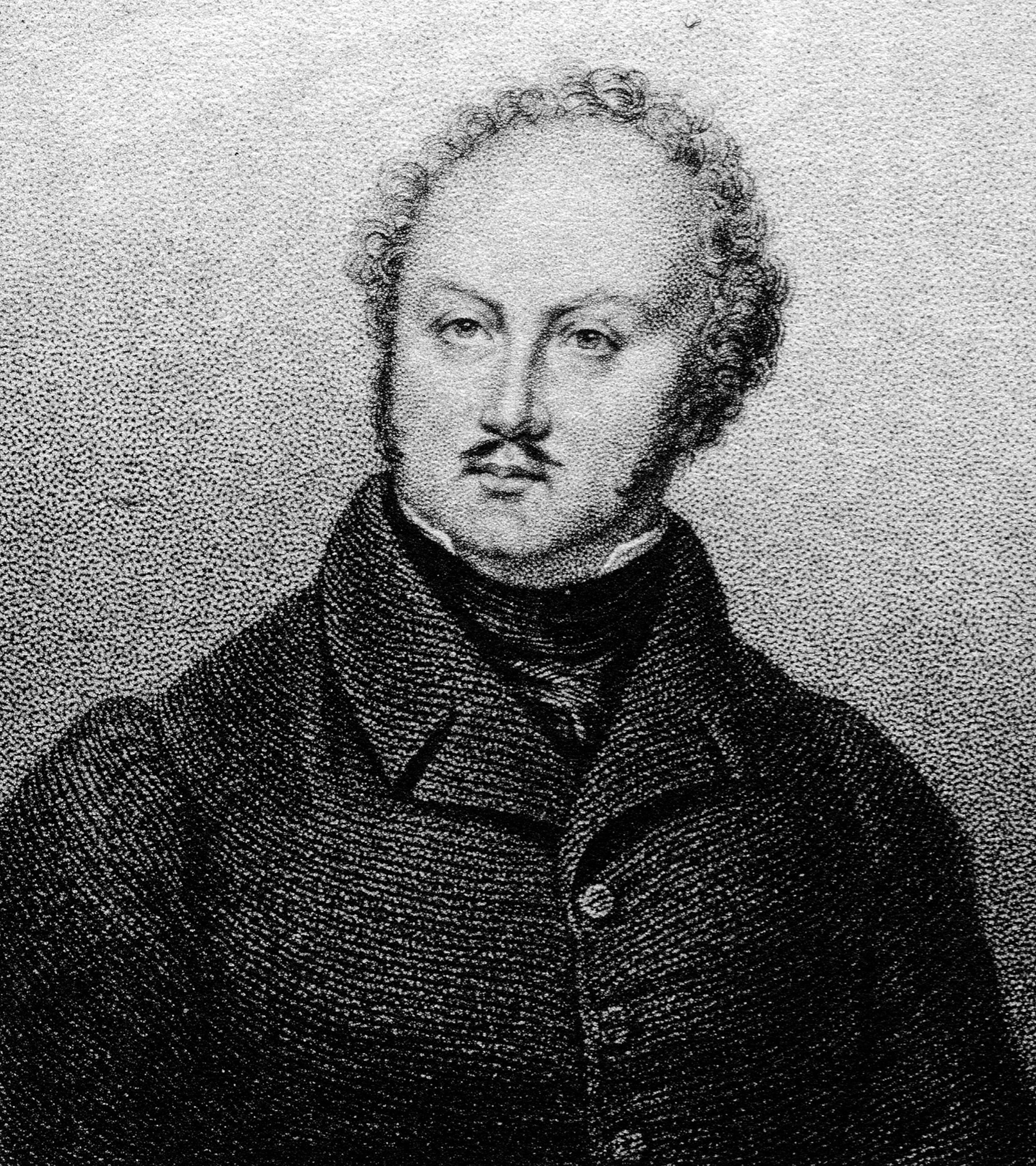 Black and white portrait of a man from the chest up, with a mustache and curly hair, wearing a 19th century clothing