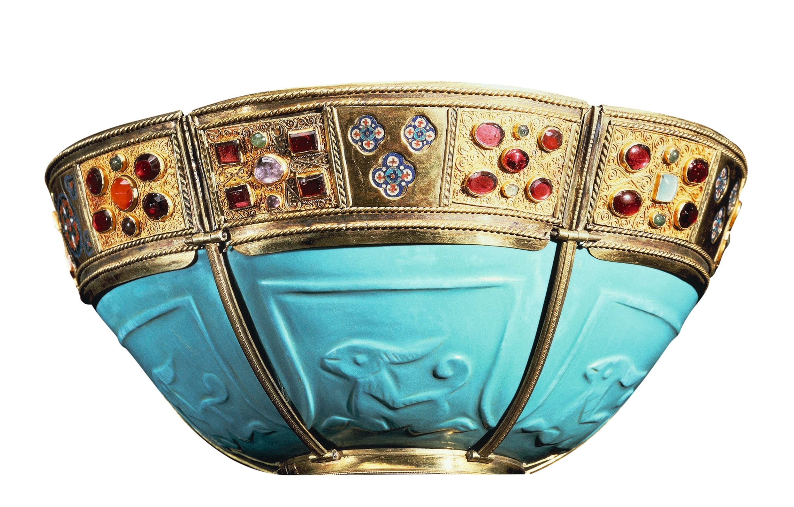 Cup made of carved turquoise with stylized animals.