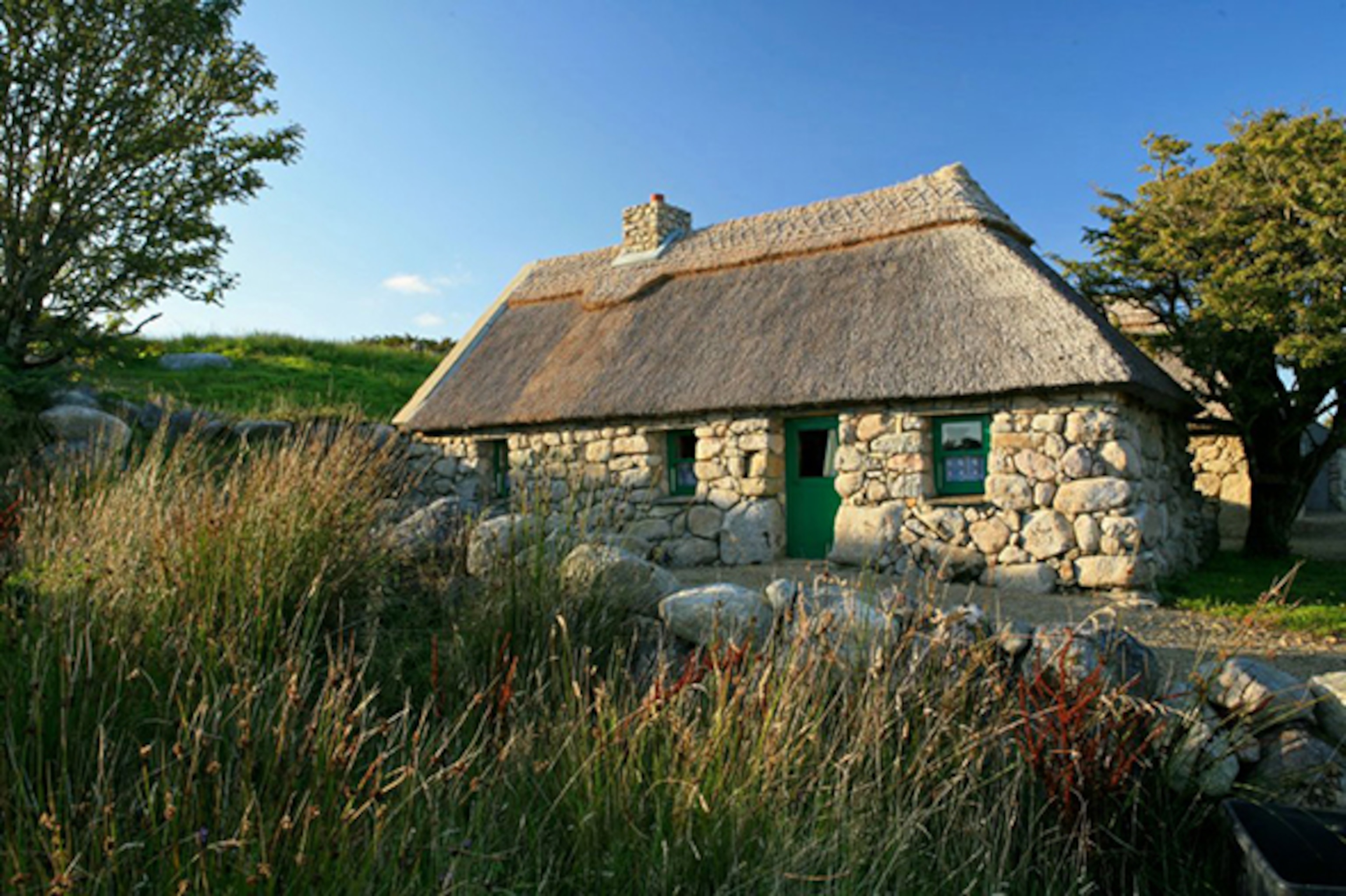 A stone thatched cottage at Cnoc Suain Cultural Retreat, Connemara (Photograph by Todd Parker)