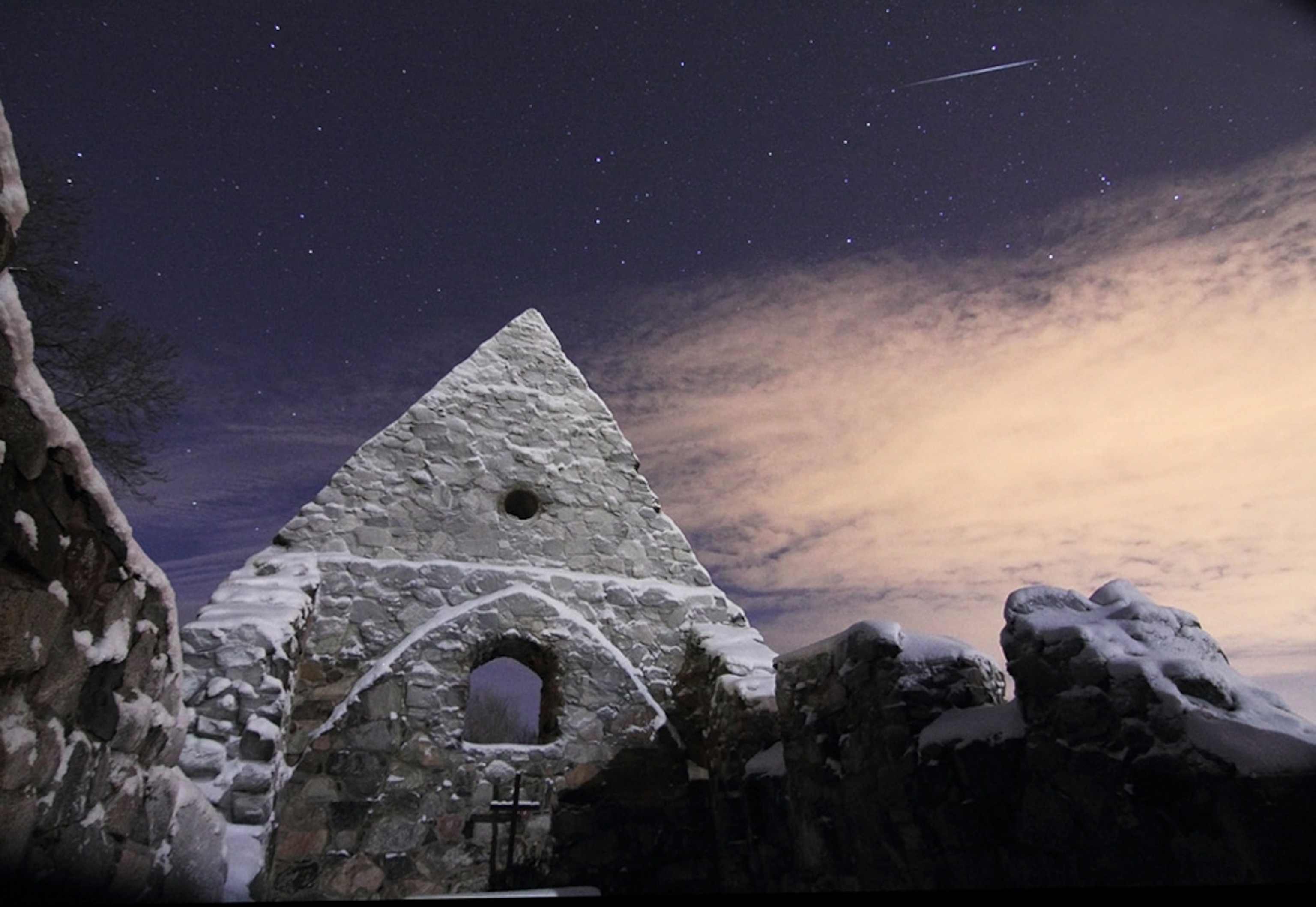 A Geminid meteor is seen above a Viking church (Geminid meteor shower picture)