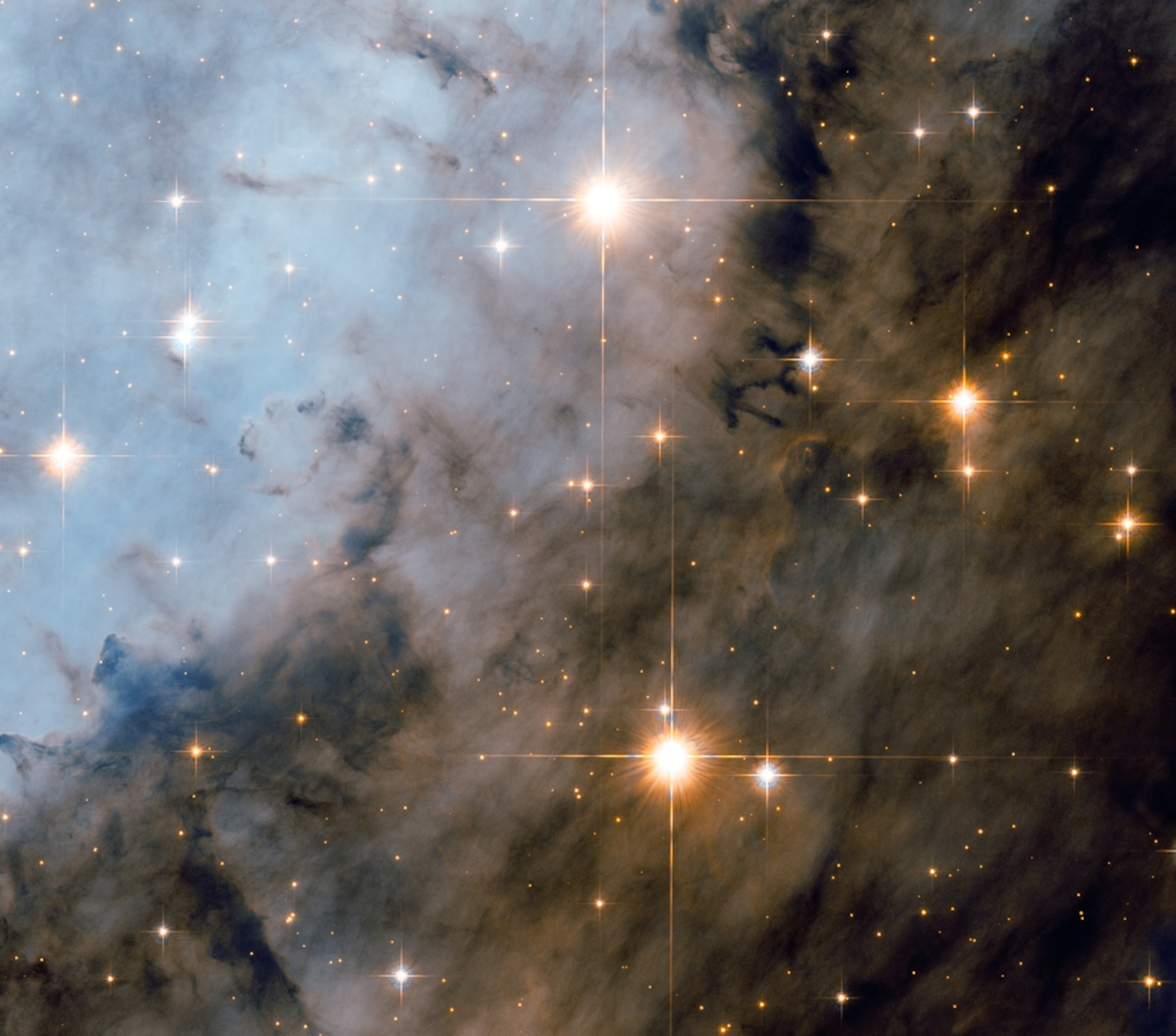 Bright, young stars in the Eagle nebula picture.
