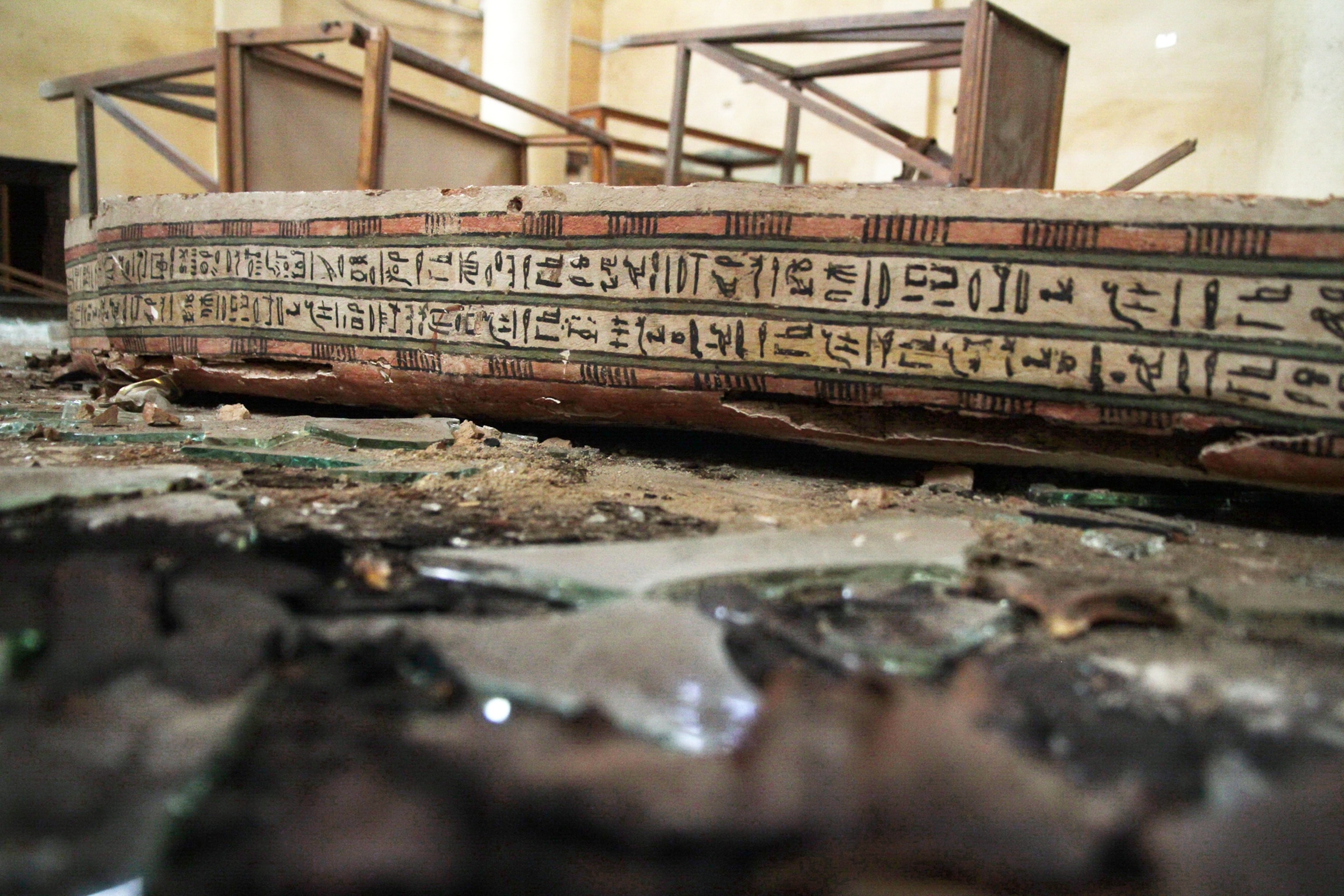 Mallawi Museum - Picture of wooden coffin damaged by looters in Mallawi Museum in Egypt