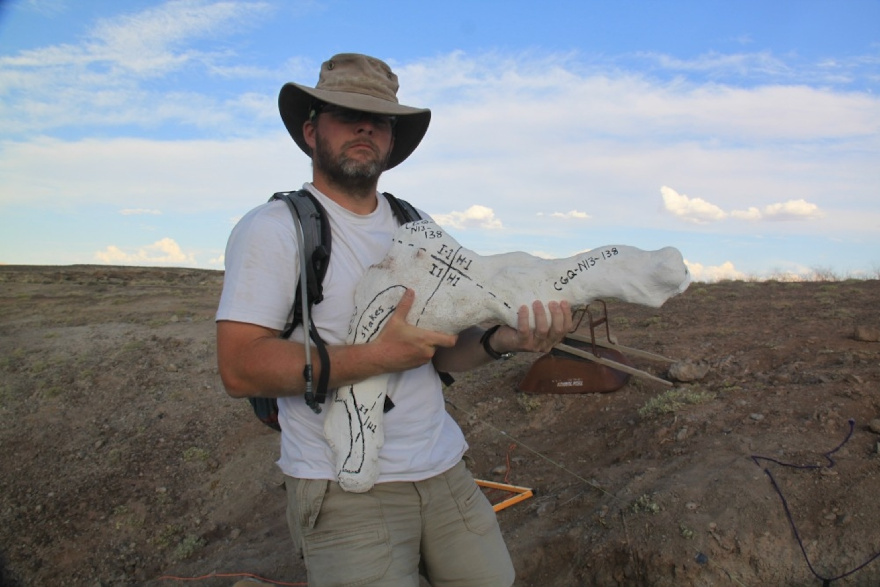 Paul Brinkman holding a jacket at Utah's Crystal Geyser Quarry. Photo Courtesy Paul Brinkman.