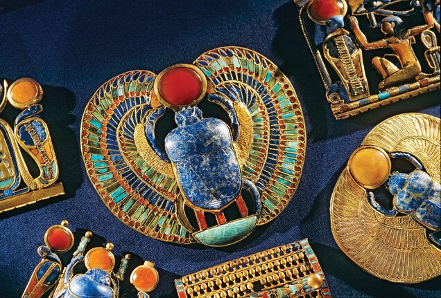 The scarab beetle, a pendant of gold and semiprecious stones, was found among the 200-plus pieces of jewelry in Tut's tomb.
