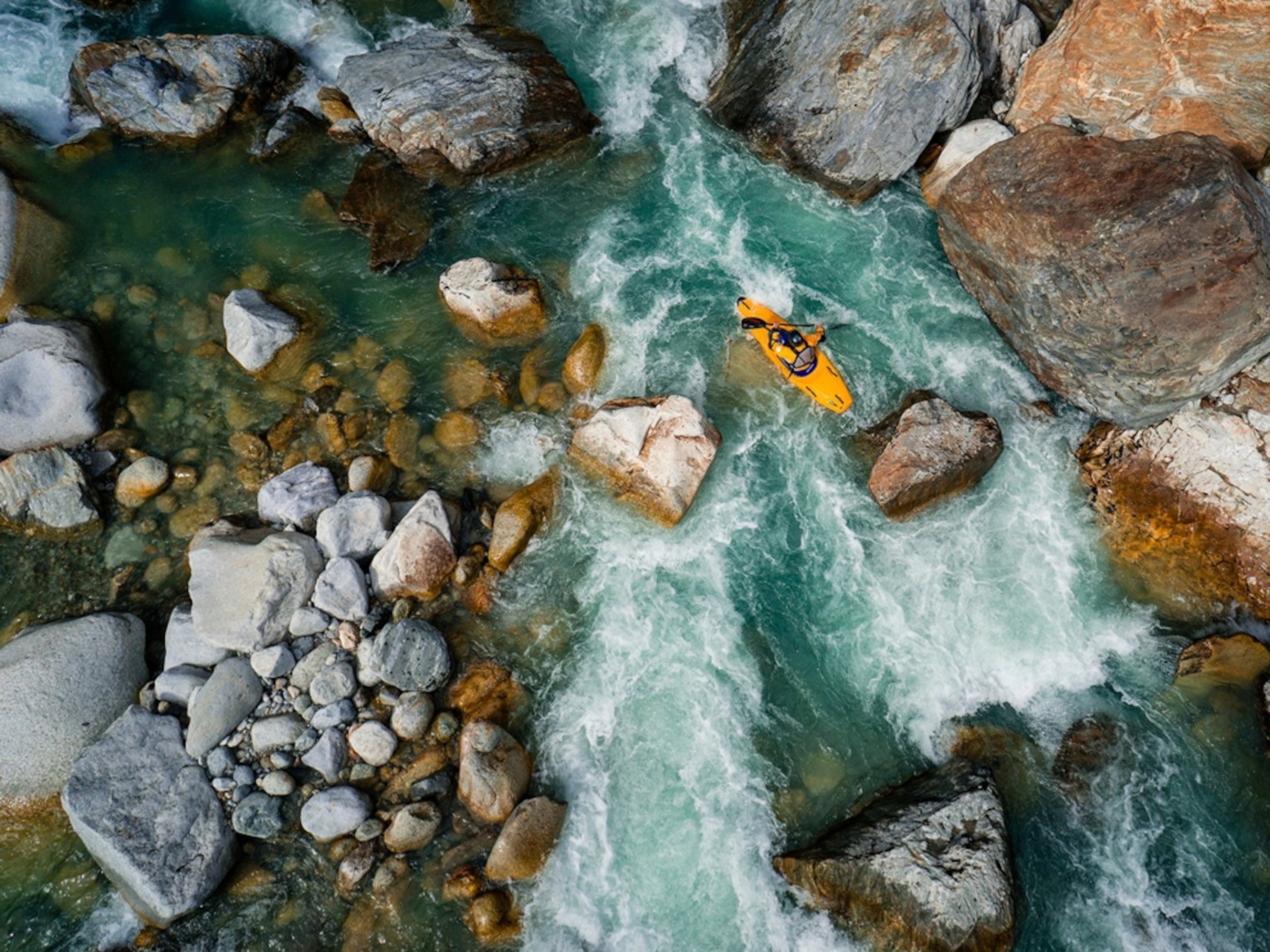 a kayaker in the Reuss River in Switzerland.