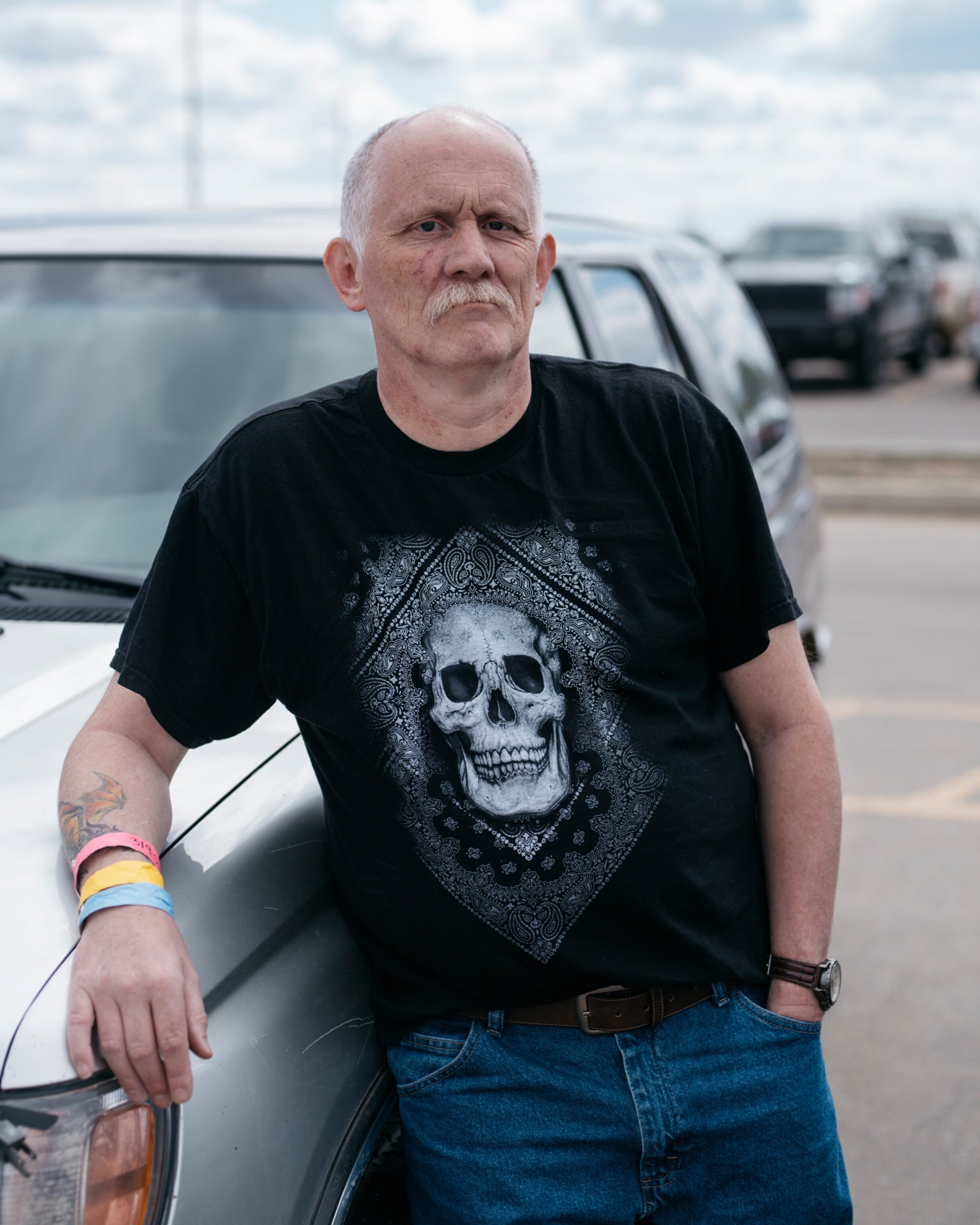 man wearing t-shirt with skull on it