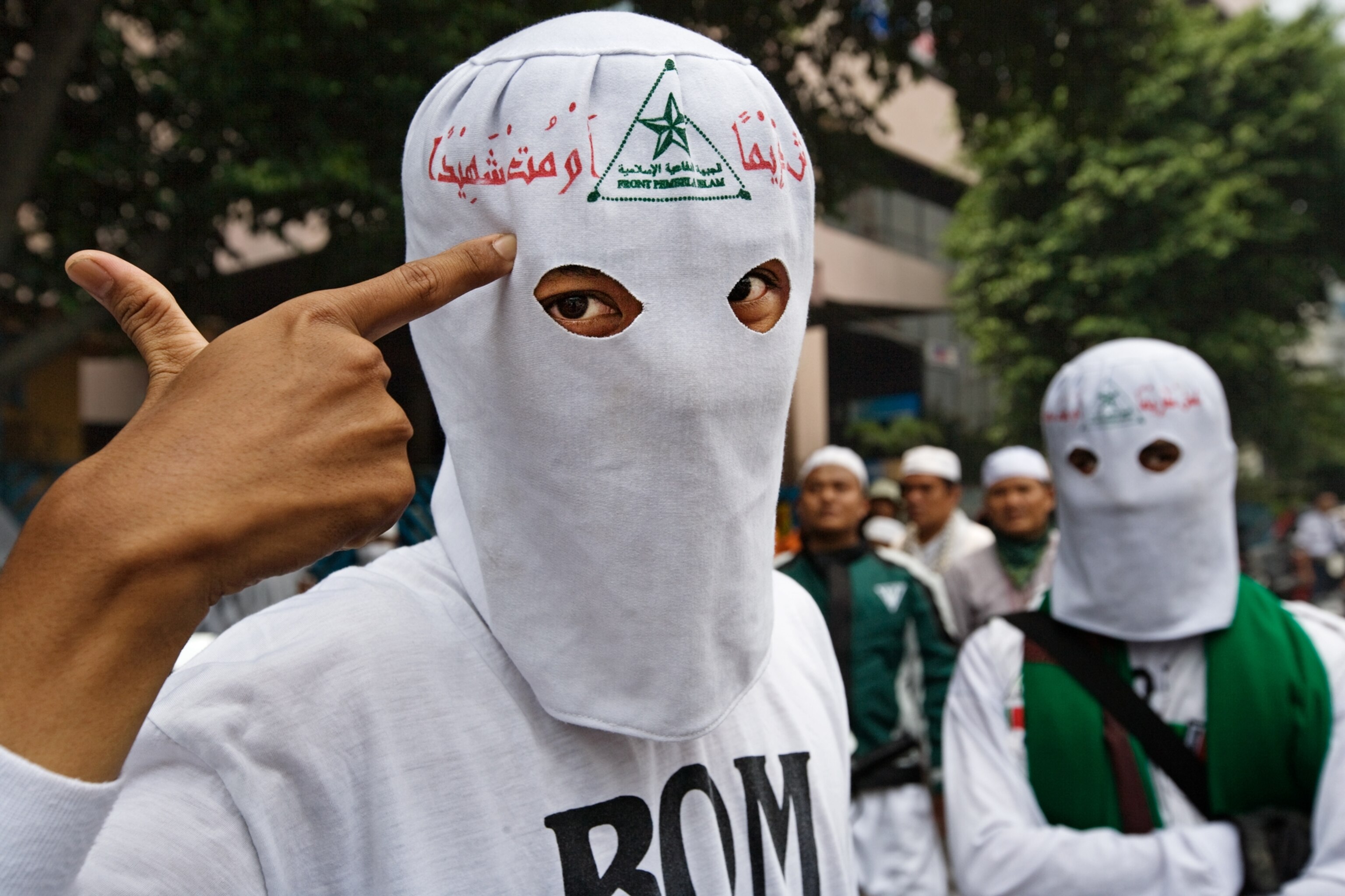 self-appointed enforcers rallying in Jakarta before and during the holy month of Ramadan
