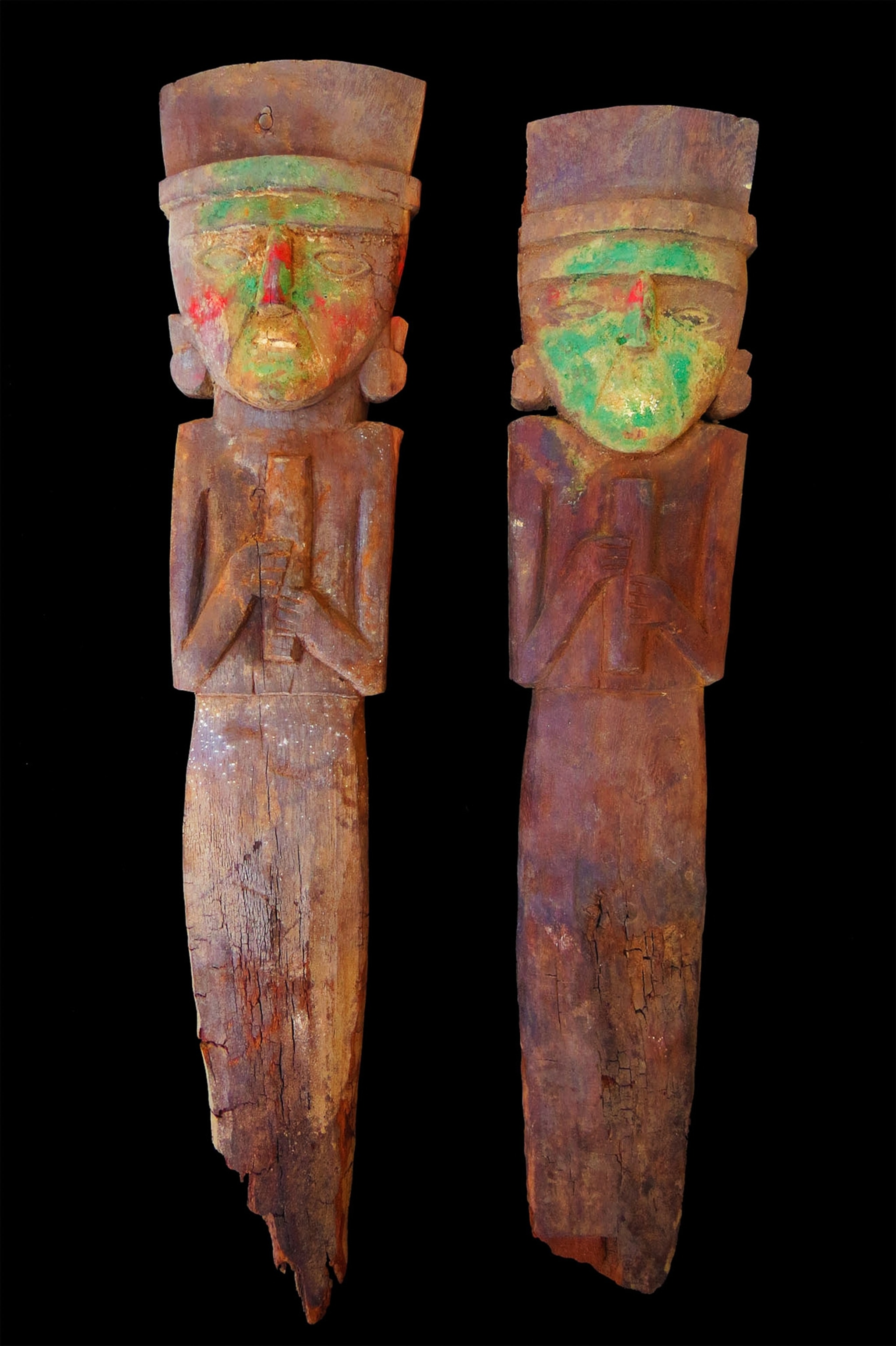 2 wooden idols.
