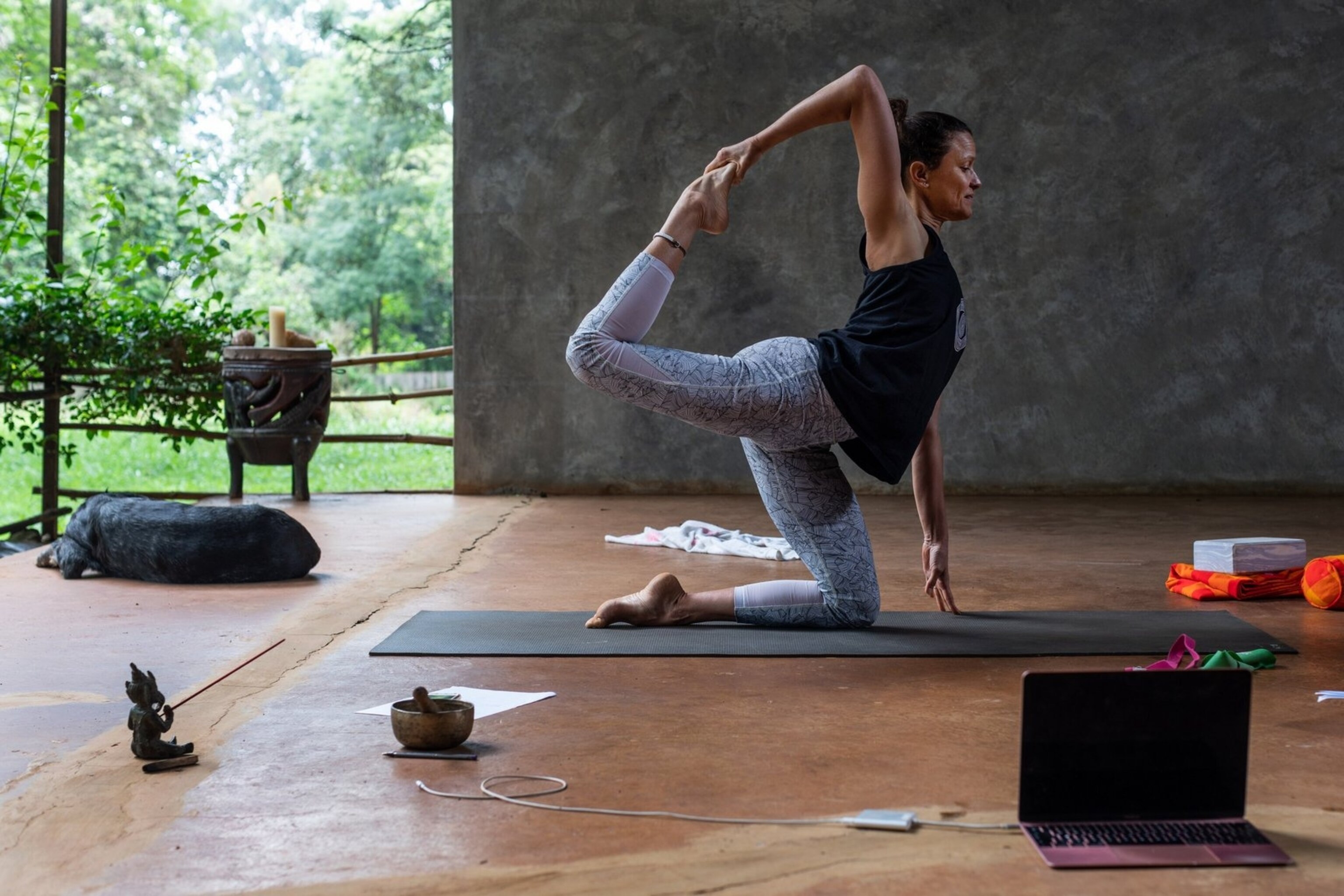 A woman stretching.