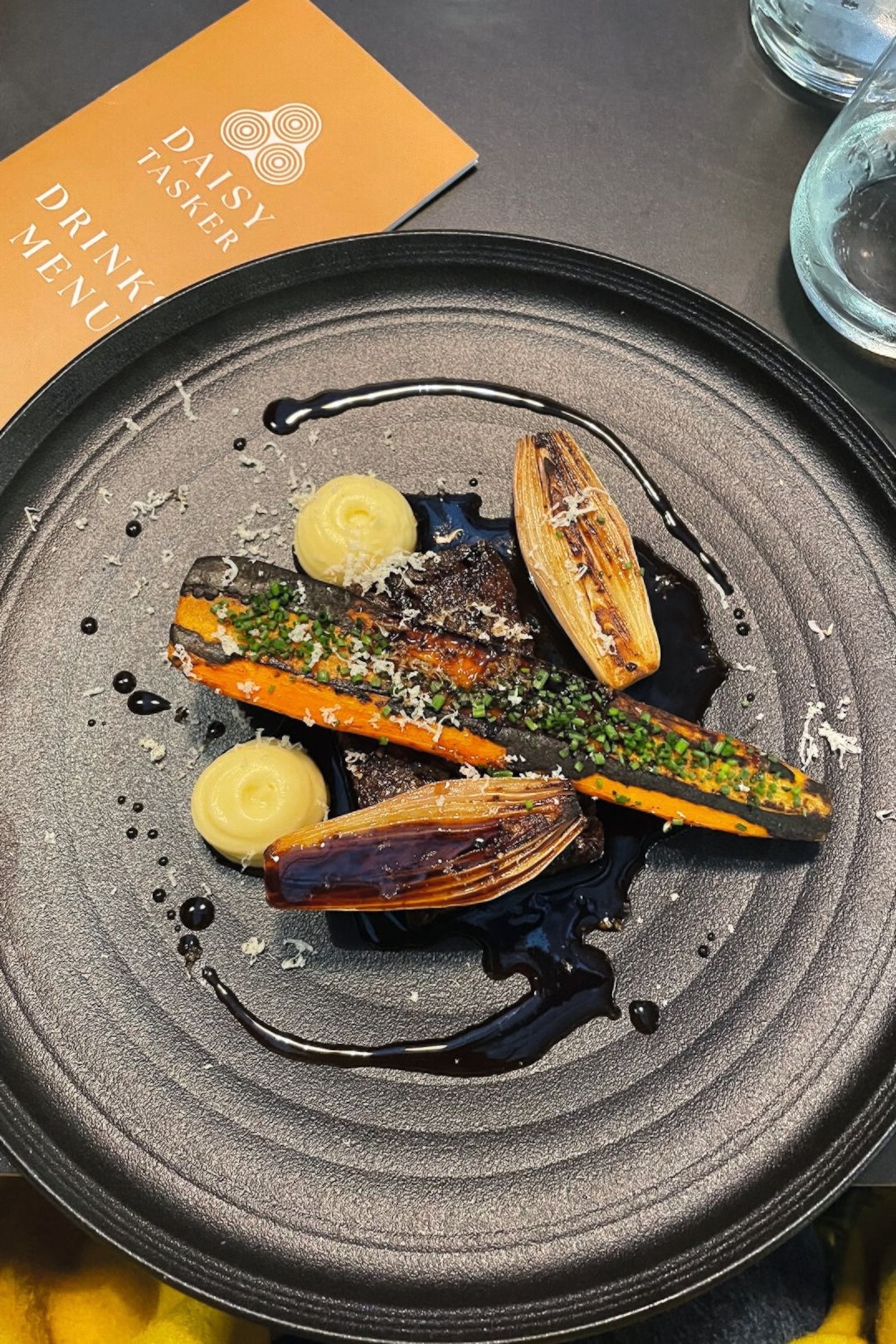 Braised blade of beef, parsnip purée, carrot and shallots at Daisy Tasker.