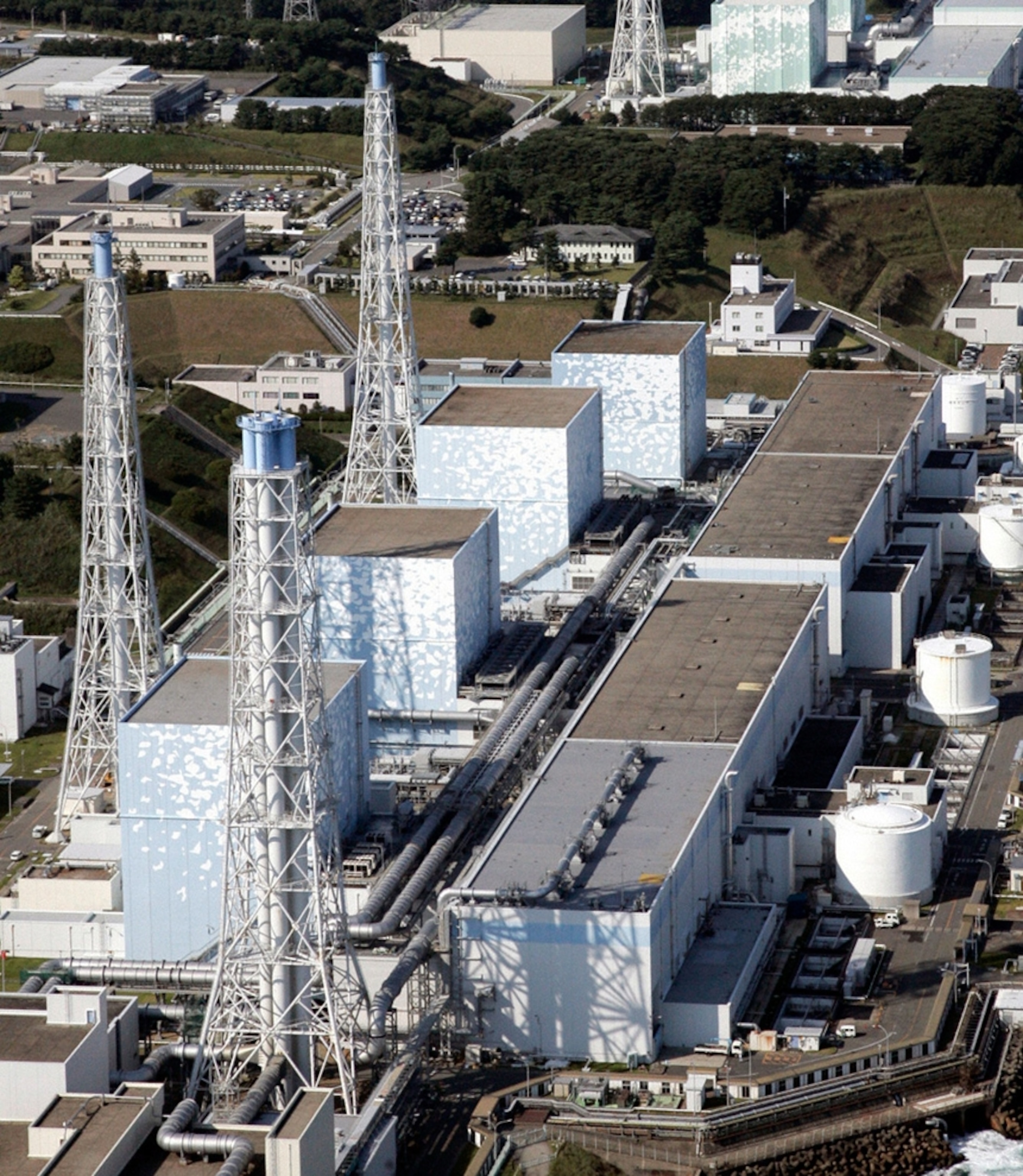 Fukushima Daiichi nuclear power plant, Japan, picture: aerial photo of reactor buildings before explosions in wake of earthquake and tsunami