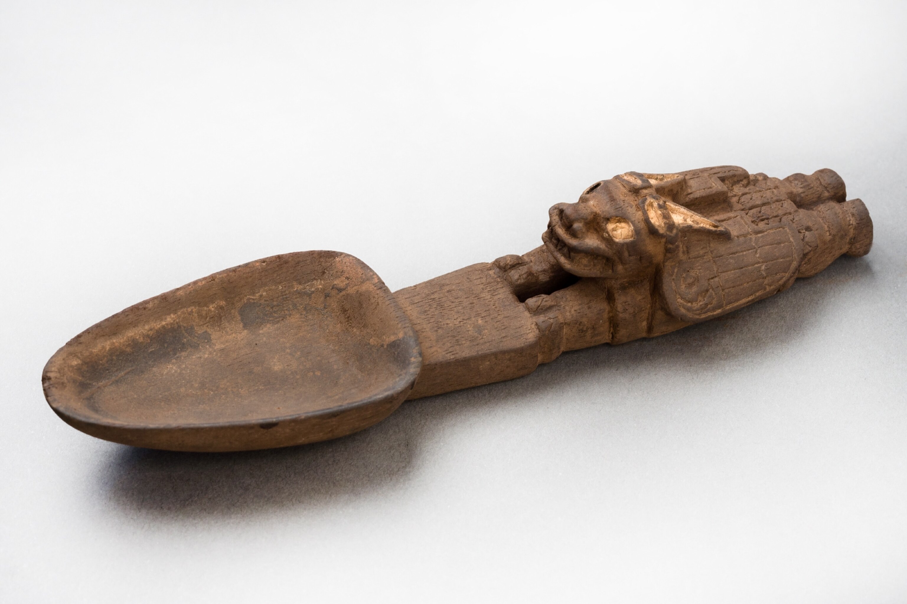 Peru Tomb - A carved spoon found in an archaeological site in Peru.