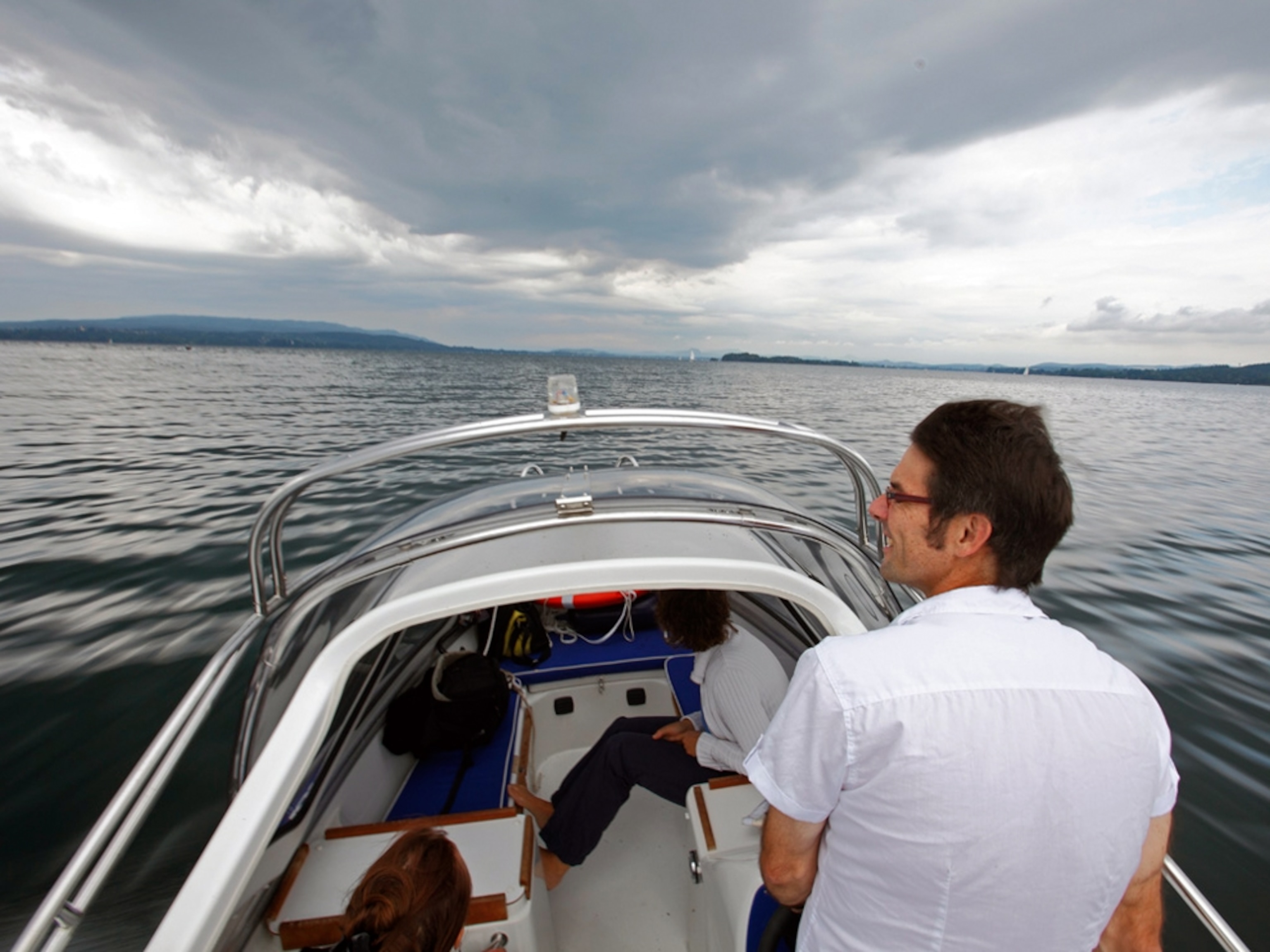 Martin Wilekski in a speedboat on a lake