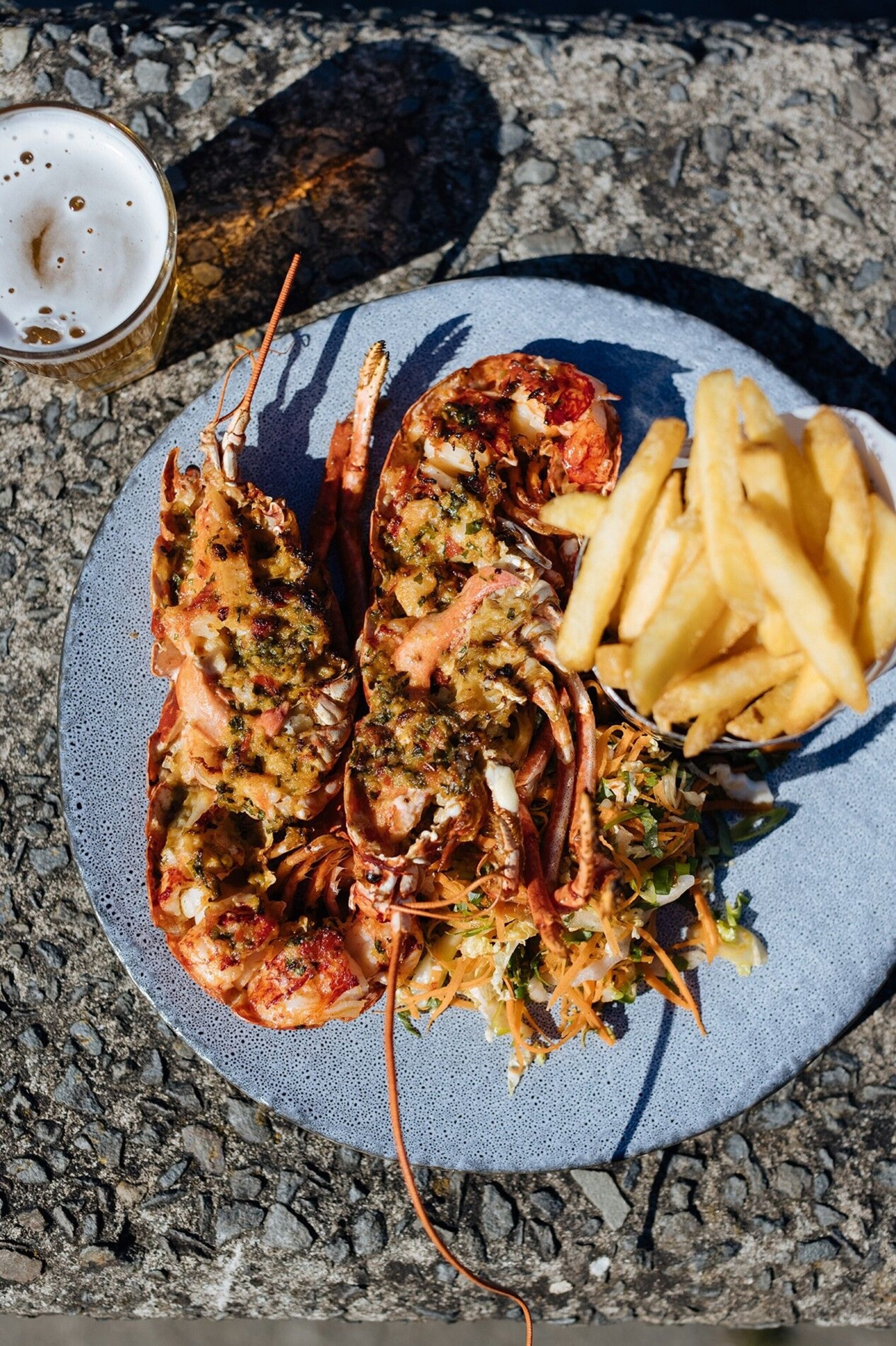 Lobster, chips and a beer at the Harbourmaster Hotel. Here, the menu is decidedly local.