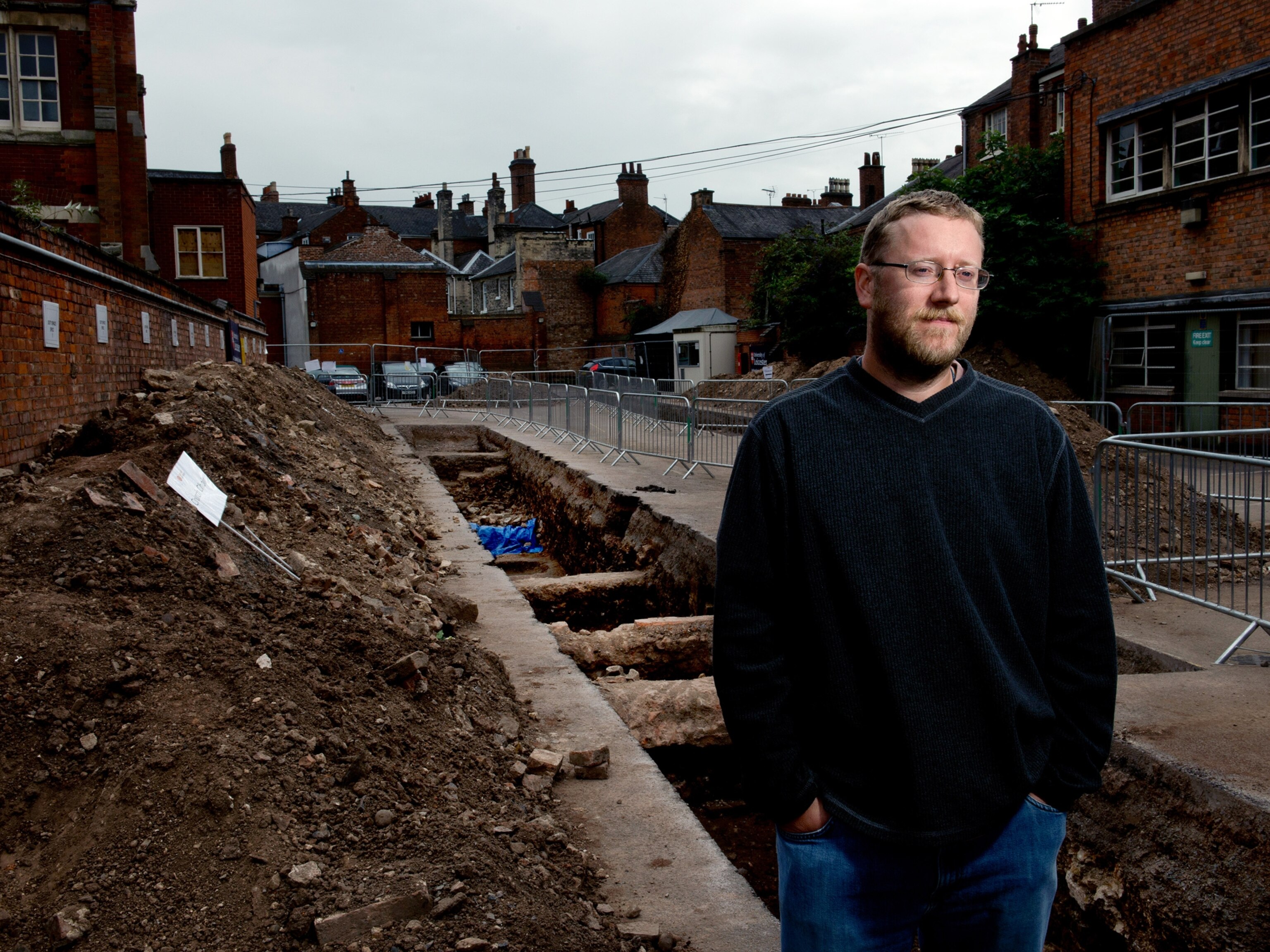 An archaeologist next to a trench that may have hosted King Richard III for centuries in Leicester, England, United Kingdom.