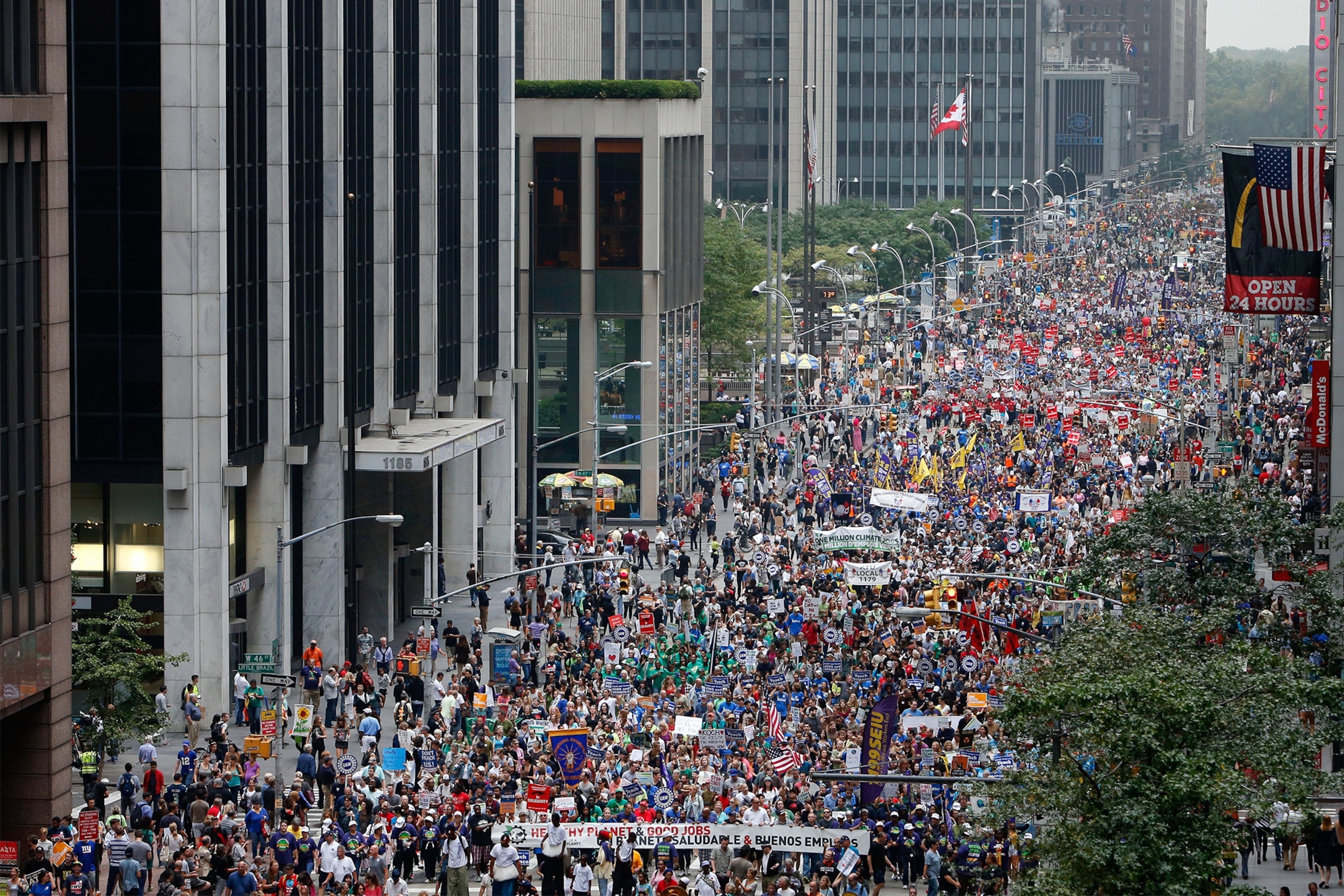 a woman in Brazil participating in the People's Climate March