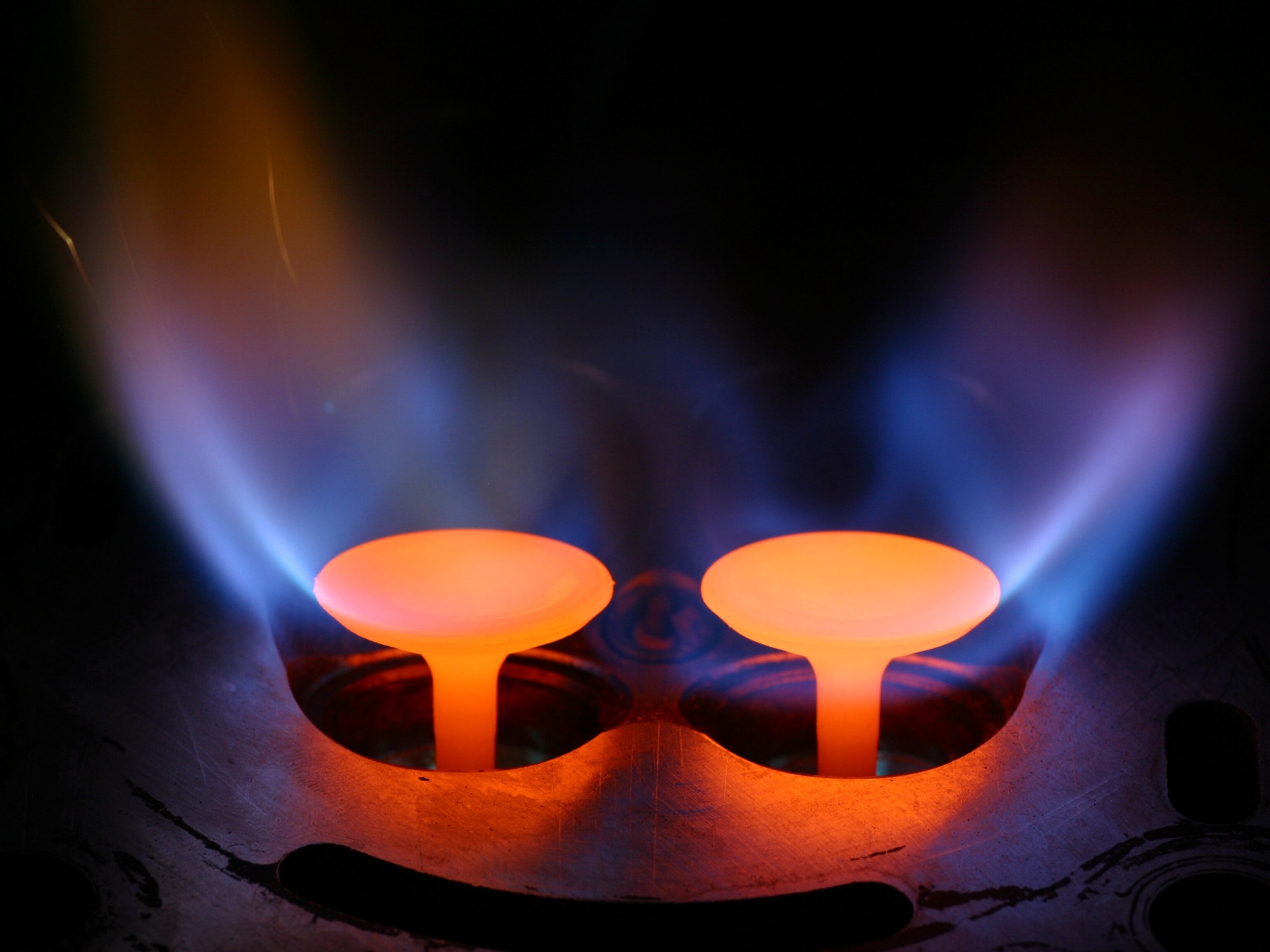 Hot gas inside an automotive engine.