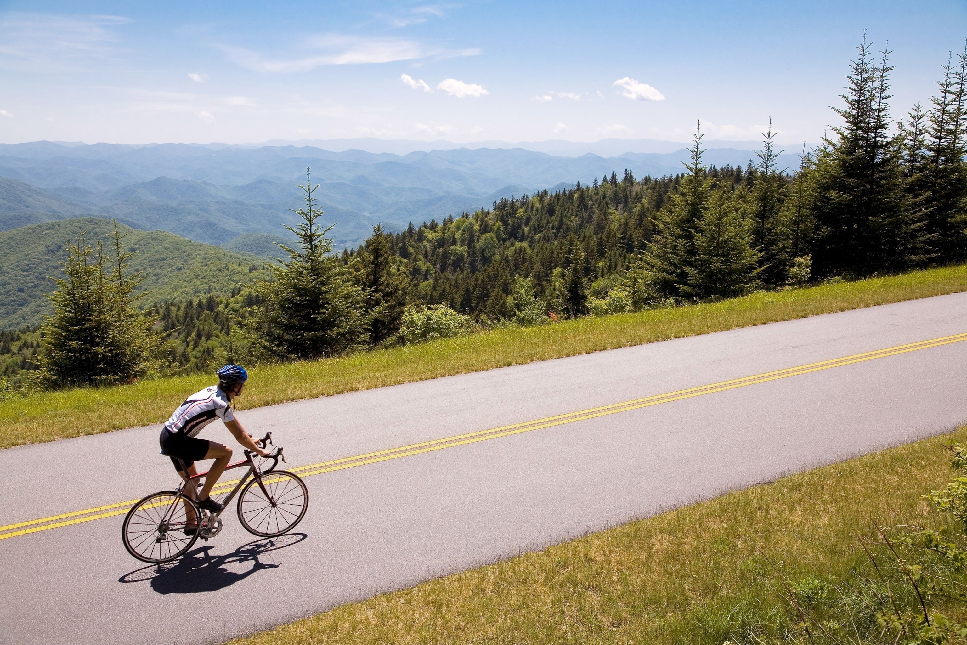 a bicyclist on the Blue Ridge Parkway in Asheville, North Carolina