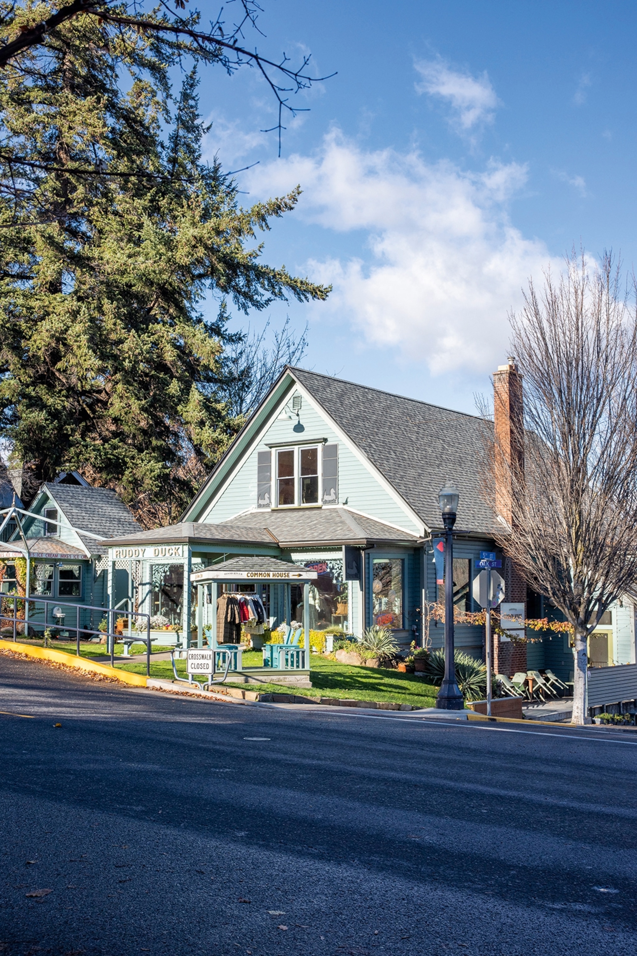A regular house on a street doubling as a shop.