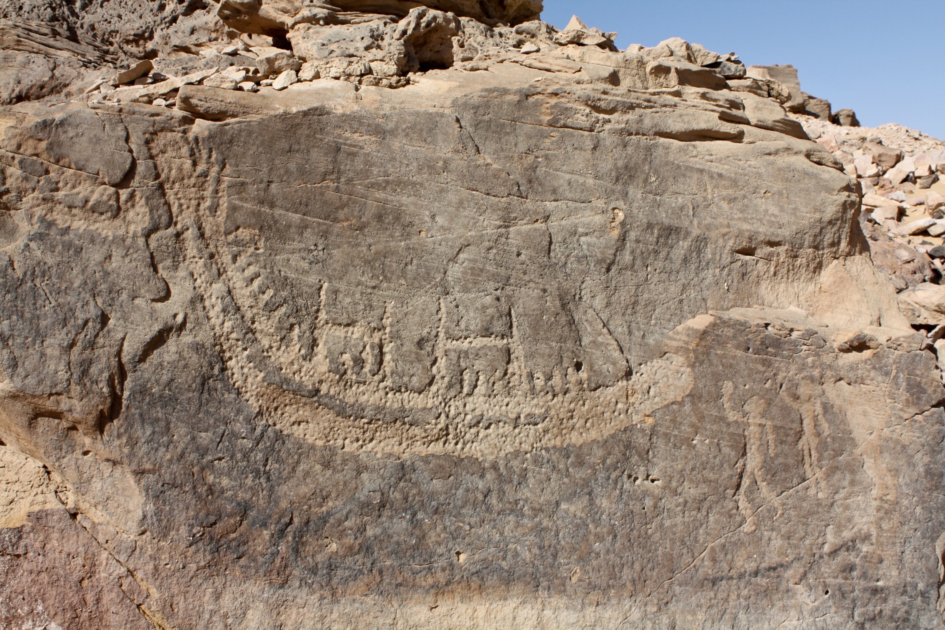 Egyptian rock art picture - prisoners tied to a boat