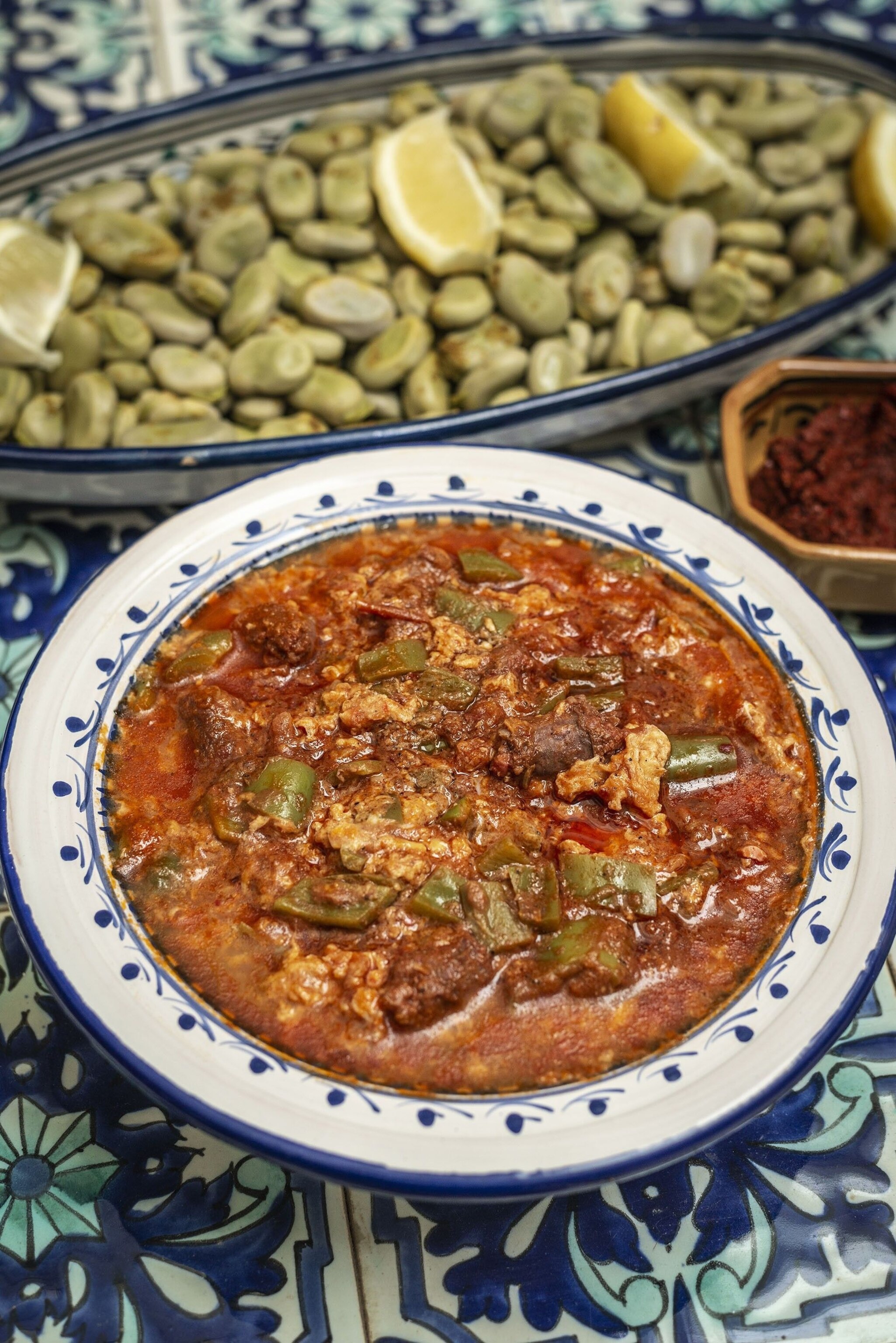 Bowls of ojja, beans and harissa