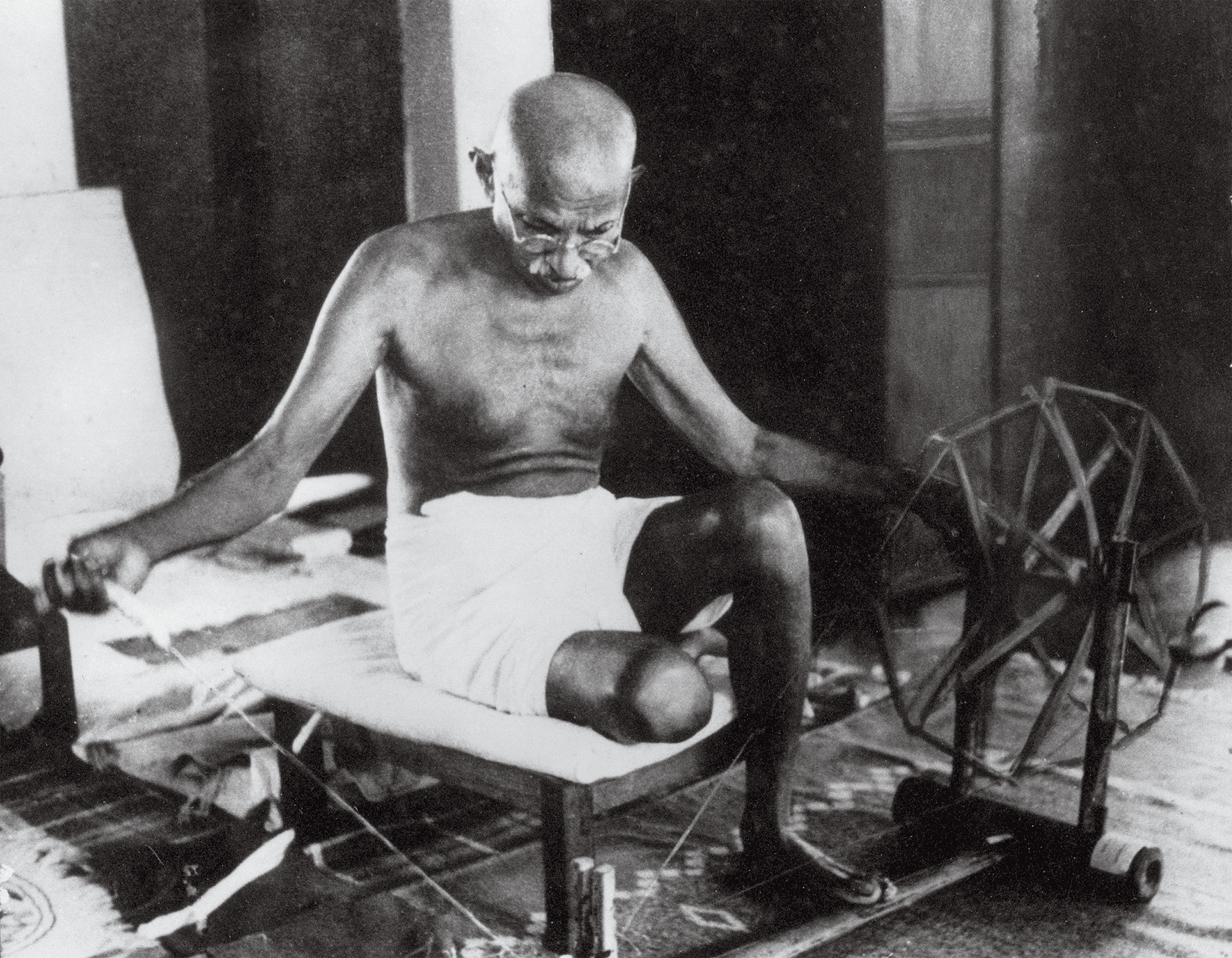 Gandhi uses a spinning wheel.