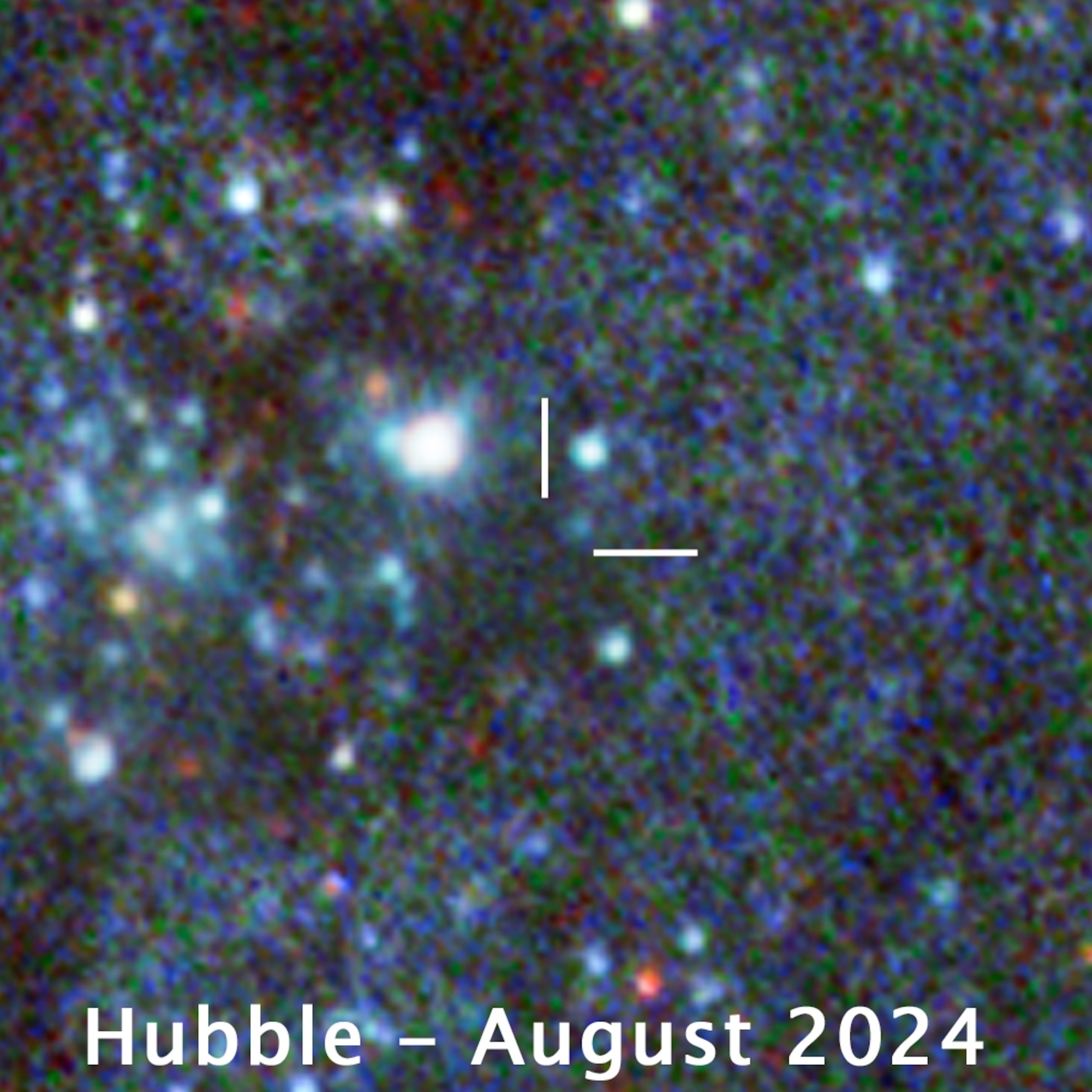 A blurred image of a starry sky, taken by Hubble in August 2024. White lines center on a dark spot