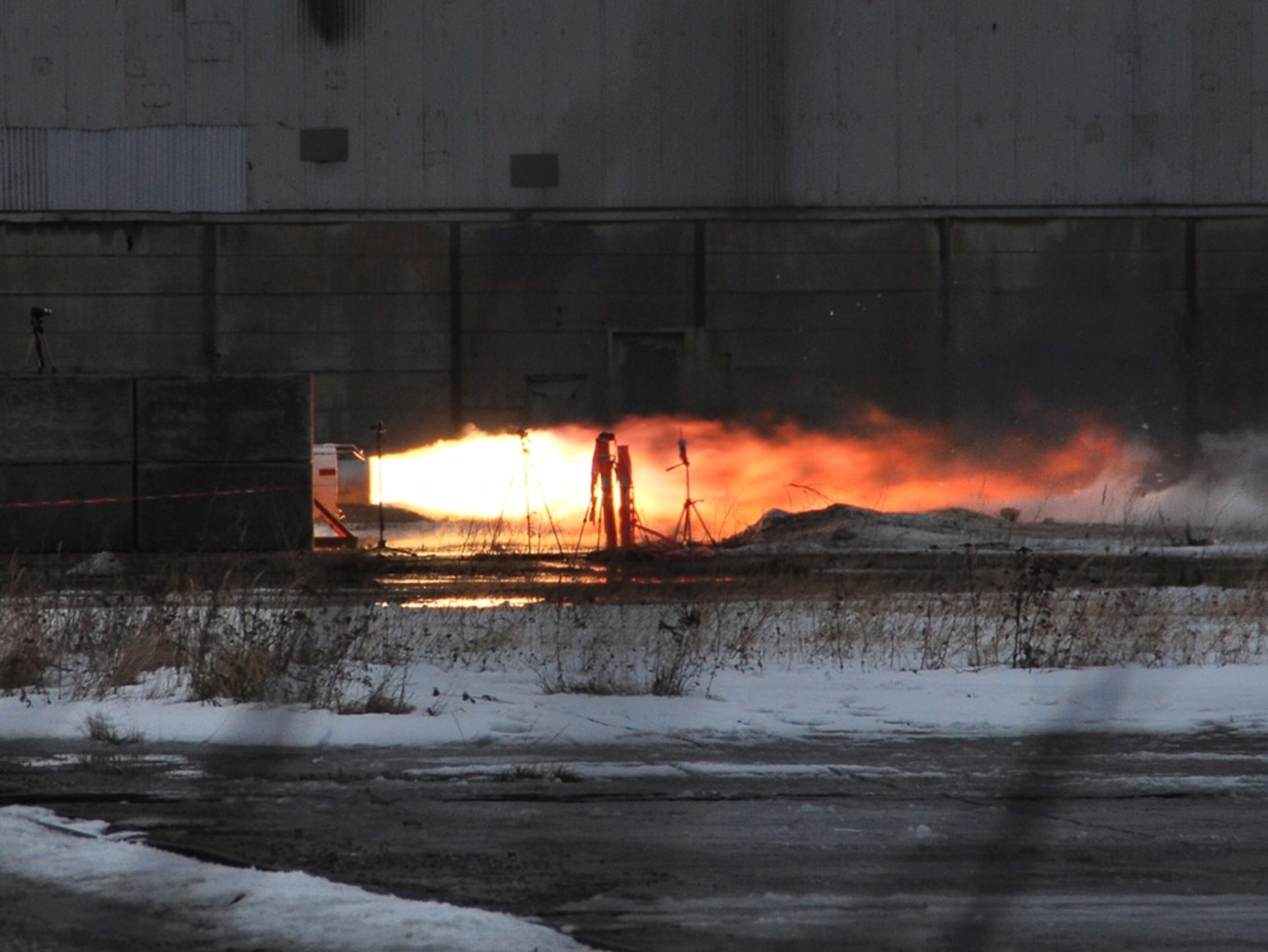 the HEAT-1X booster shooting a flame jet