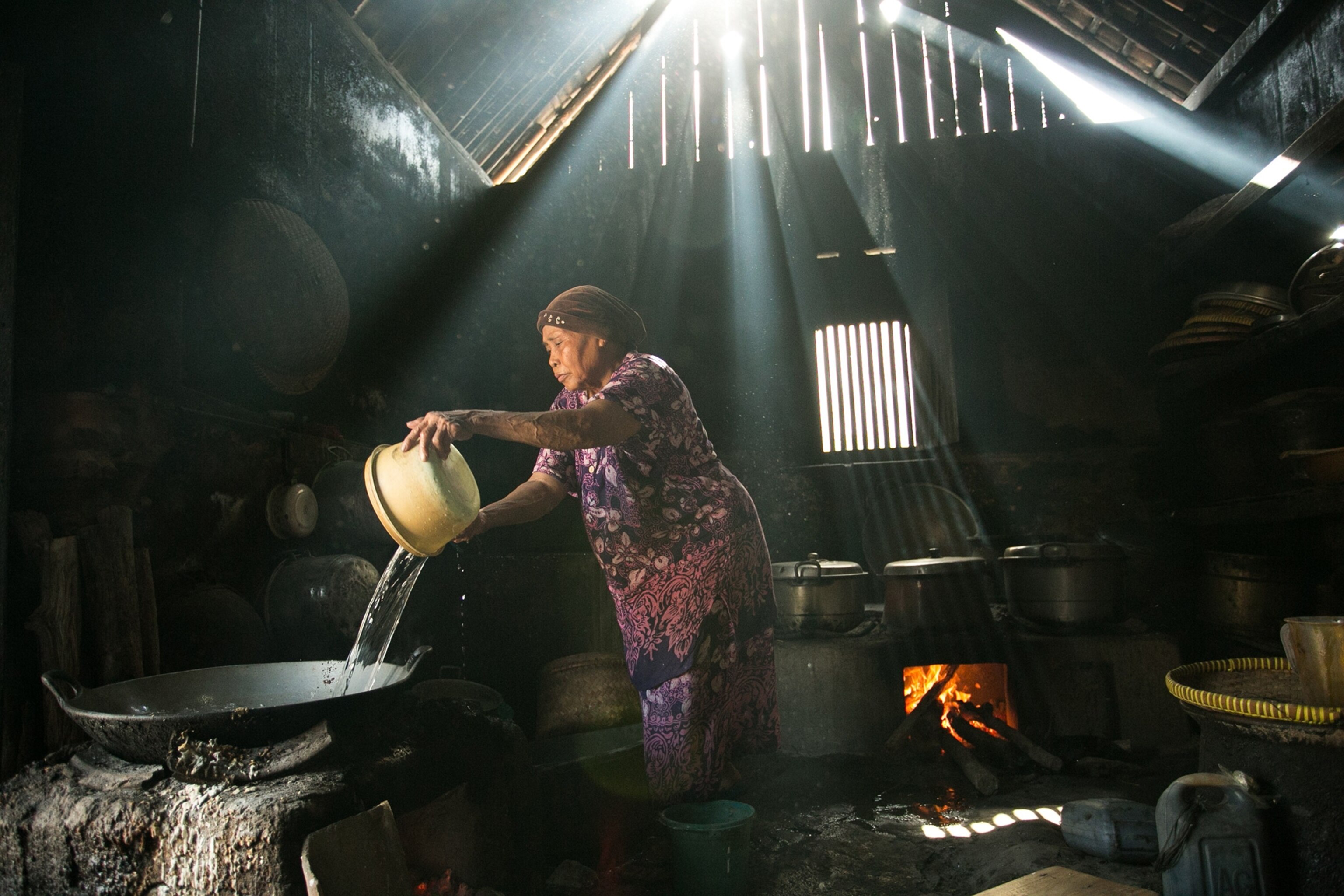 Daily activity a mother cook water to prepare soup. What make me want to stay more in there that this woman always keep talking about how to cook even just cooking water.