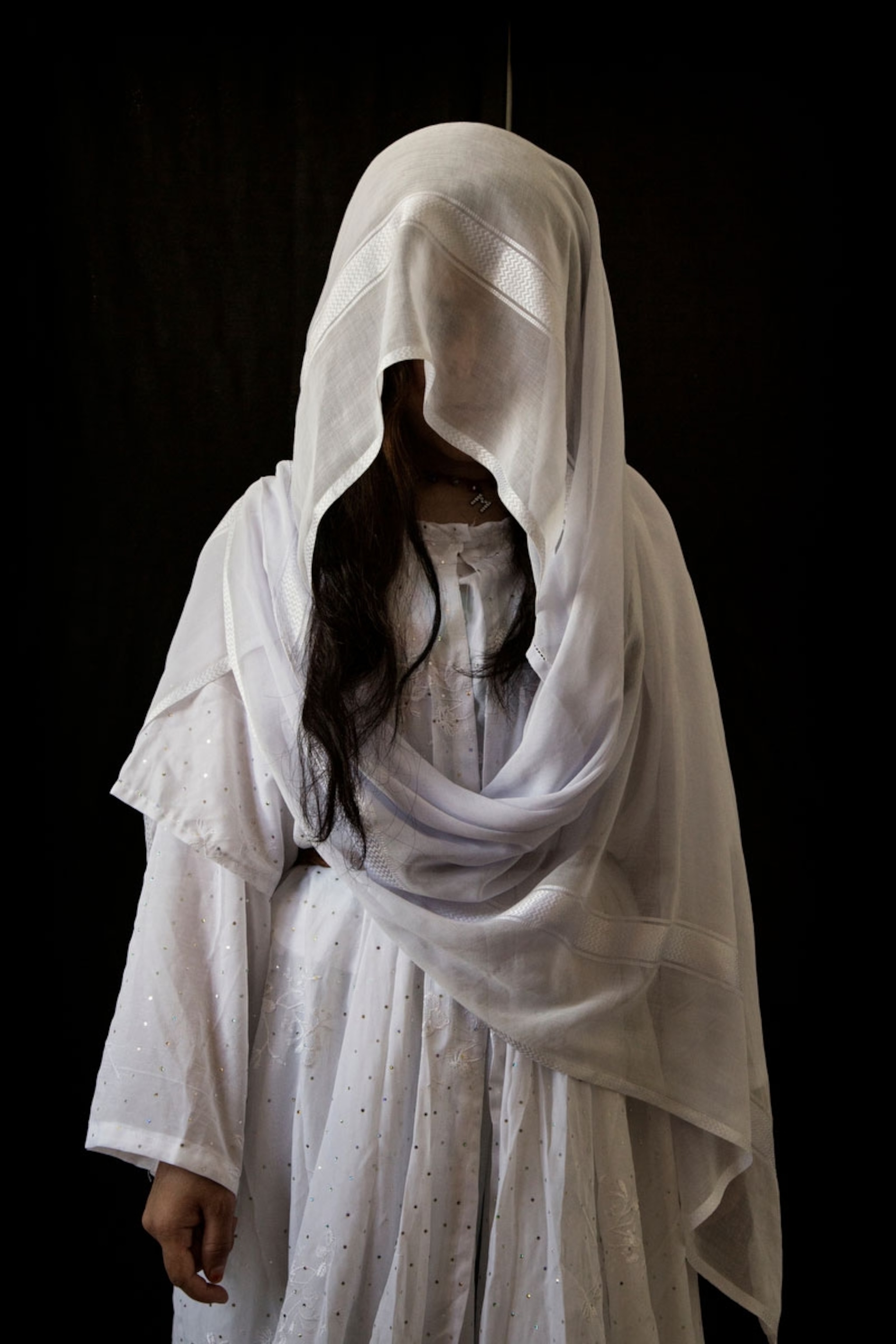 a Yazidi woman who was held as a slave by ISIS